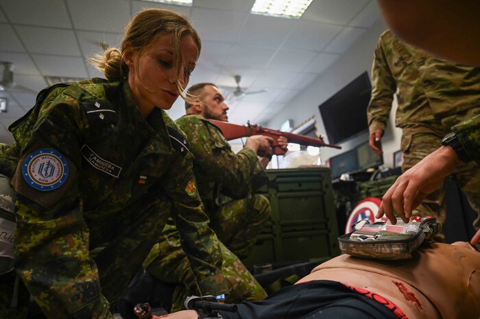 Second Lt. Georgieva Gamisheva, a service member from Bulgaria, practices tactical combat tragedy care procedures at Ramstein Air Base, Germany, Sept. 18, 2024. This engagement  advanced the mission of enhanced cooperation between international military medical teams from Bulgaria, Bosnia and Herzegovina, Montenegro and Slovakia, reinforcing their shared ability to provide critical care during future joint-combined operations. (U.S. Air Force Photo by Airman 1st. Class Dylan Myers)