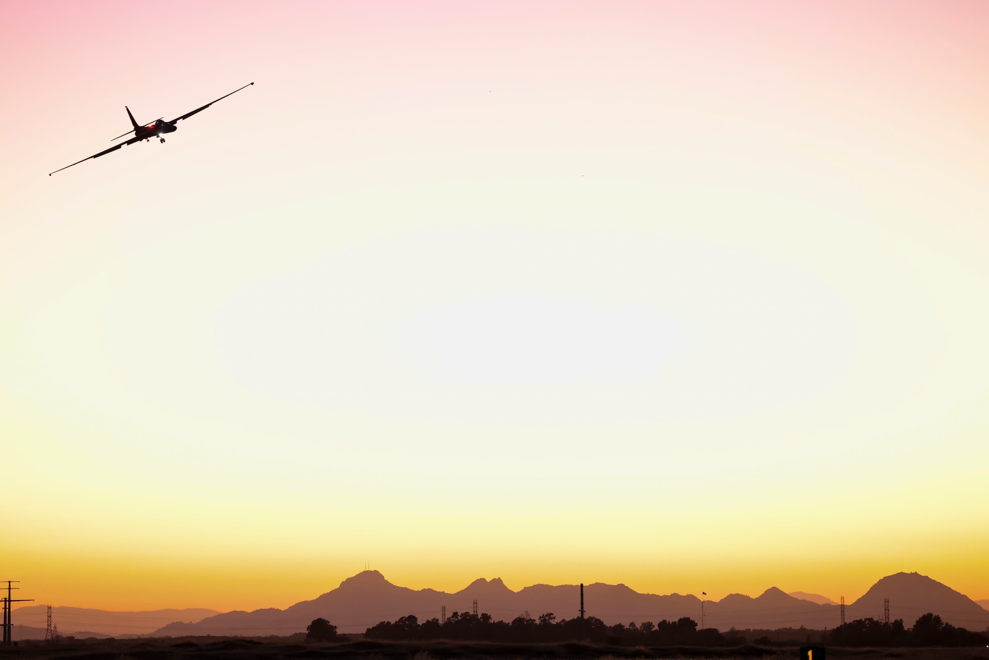 A U.S. Air Force 99th Reconnaissance Squadron TU-2S Dragon Lady flies over the Sutter Buttes at dusk on Beale Air Force Base, California, Aug. 15, 2024.