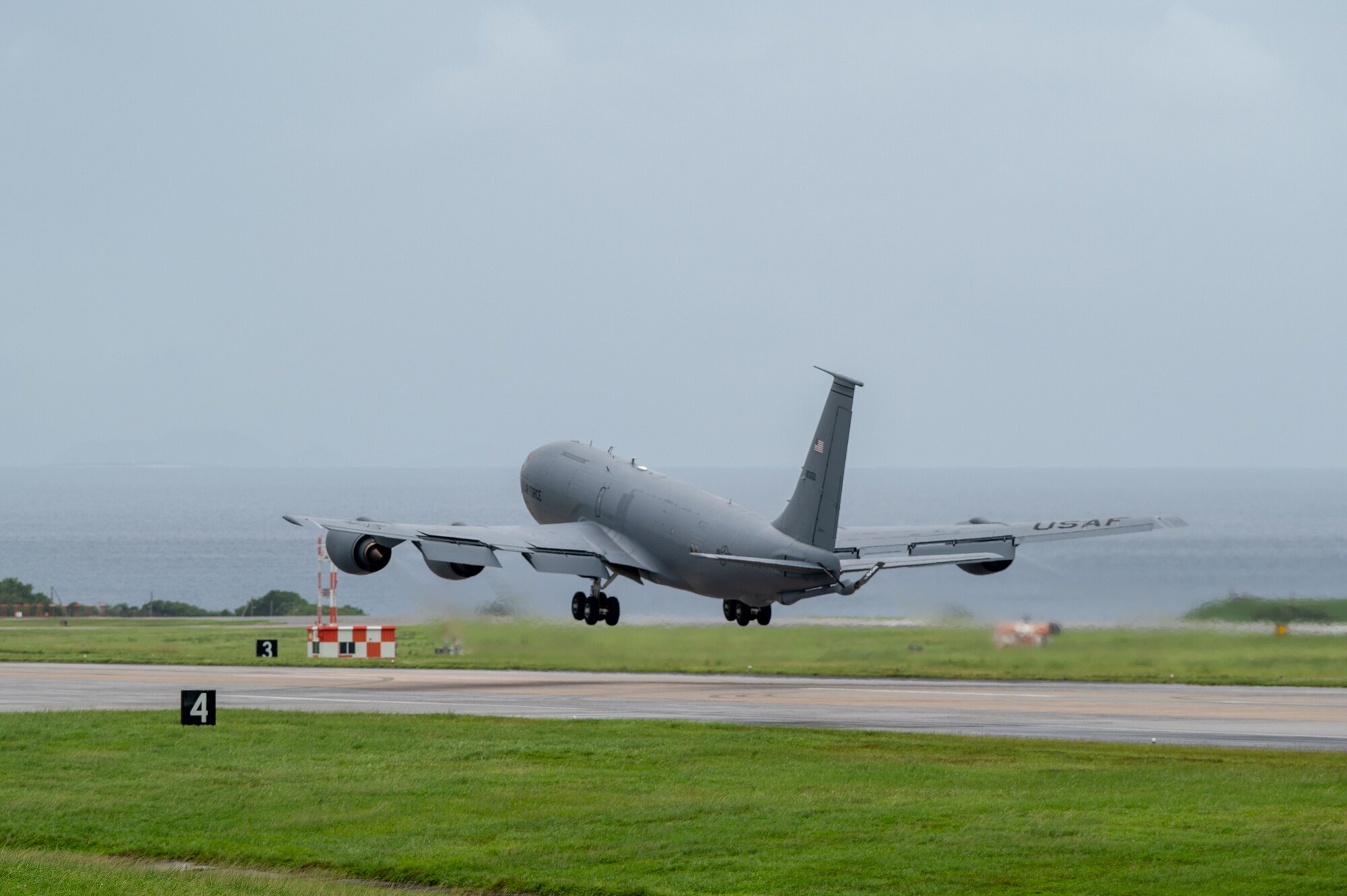 A KC-135 Stratotanker assigned to the 909th Air Refueling Squadron, departs  for exercise Southern Beach at Kadena Air Base, Japan, Sept. 19, 2024. The 909th ARS provided aerial refueling to fighter jets in support of Southern Beach, an exercise    focused on offensive and defensive counter-air operations. (U.S. Air Force photo by Senior Airman Luis E. Rios Calderon)
