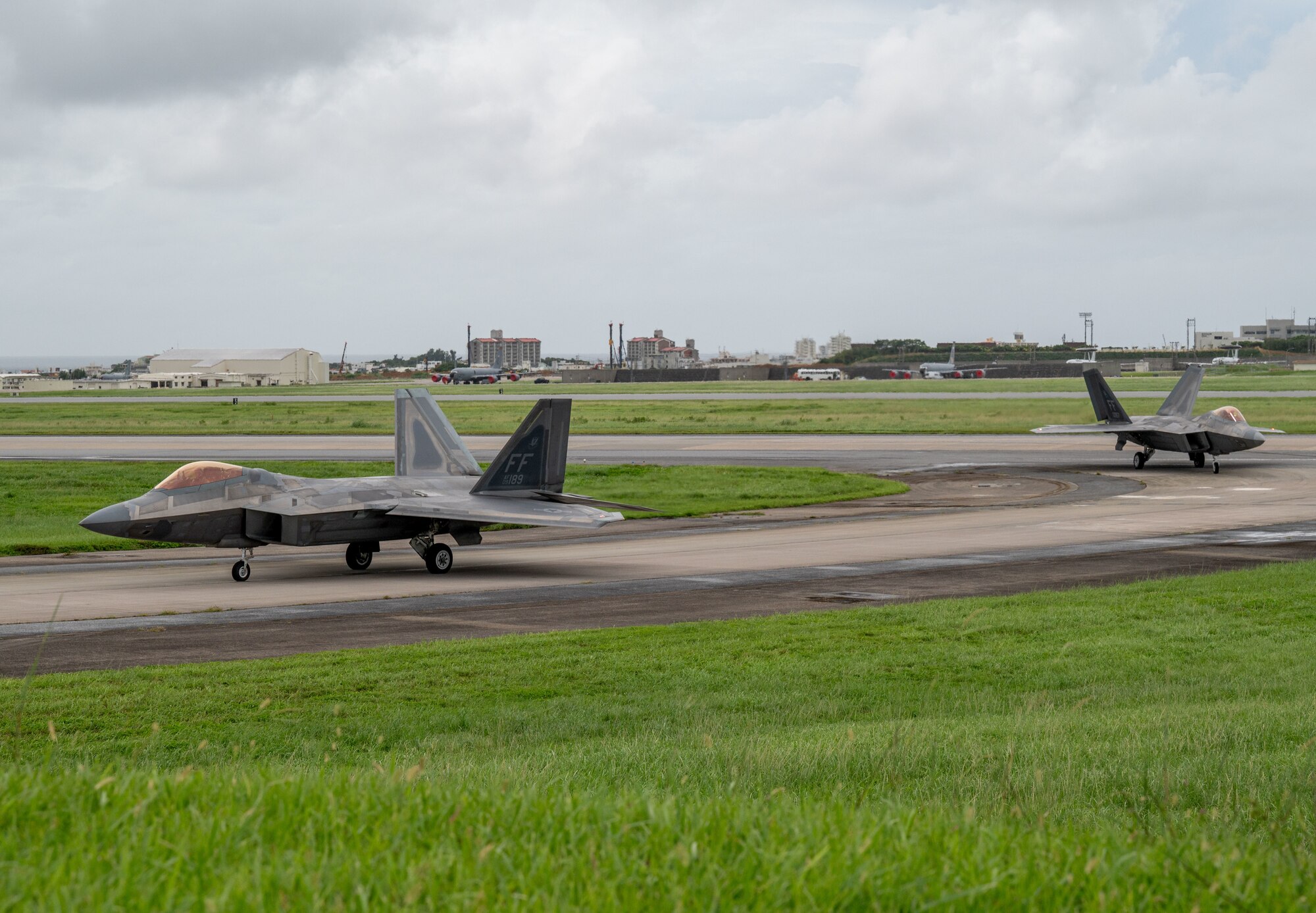 U.S. Air Force F-22A Raptors, assigned to the 1st Fighter Wing, Joint Base Langley-Eustis,  Virginia, taxi during exercise Southern Beach at Kadena Air Base, Japan, Sept. 19, 2024. Kadena routinely conducts training critical to deterring aggression and maintaining readiness to protect the vital interests of the U.S. and Japan. (U.S. Air Force photo by Senior Airman Luis E. Rios Calderon)