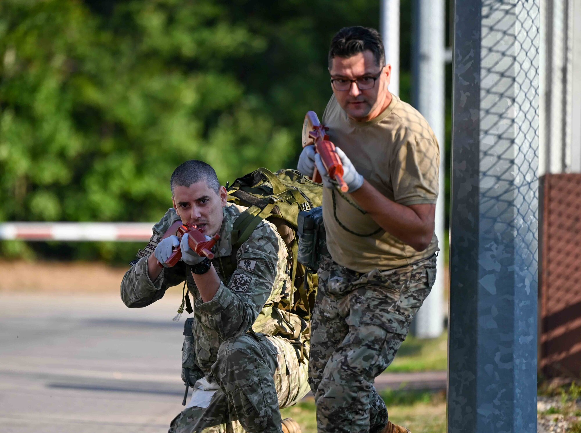 European Role 1 Development week participants simulate clearing an area for medical evacuation at Ramstein Air Base, Germany, Sept. 19, 2024.