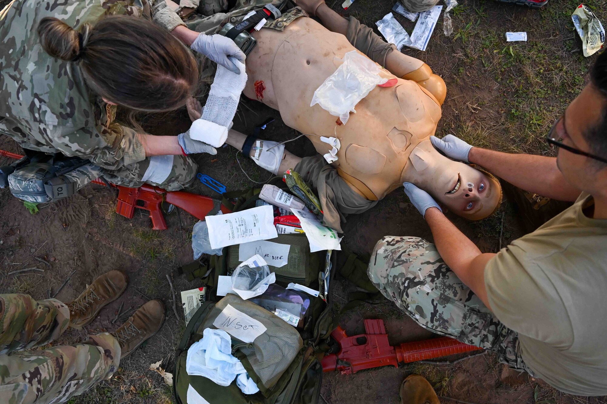 Service members from Montenegro, Bosnia and Herzegovina provide a casualty dummy with anesthesia and antibiotics at Ramstein Air Base, Germany, Sept. 19, 2024.