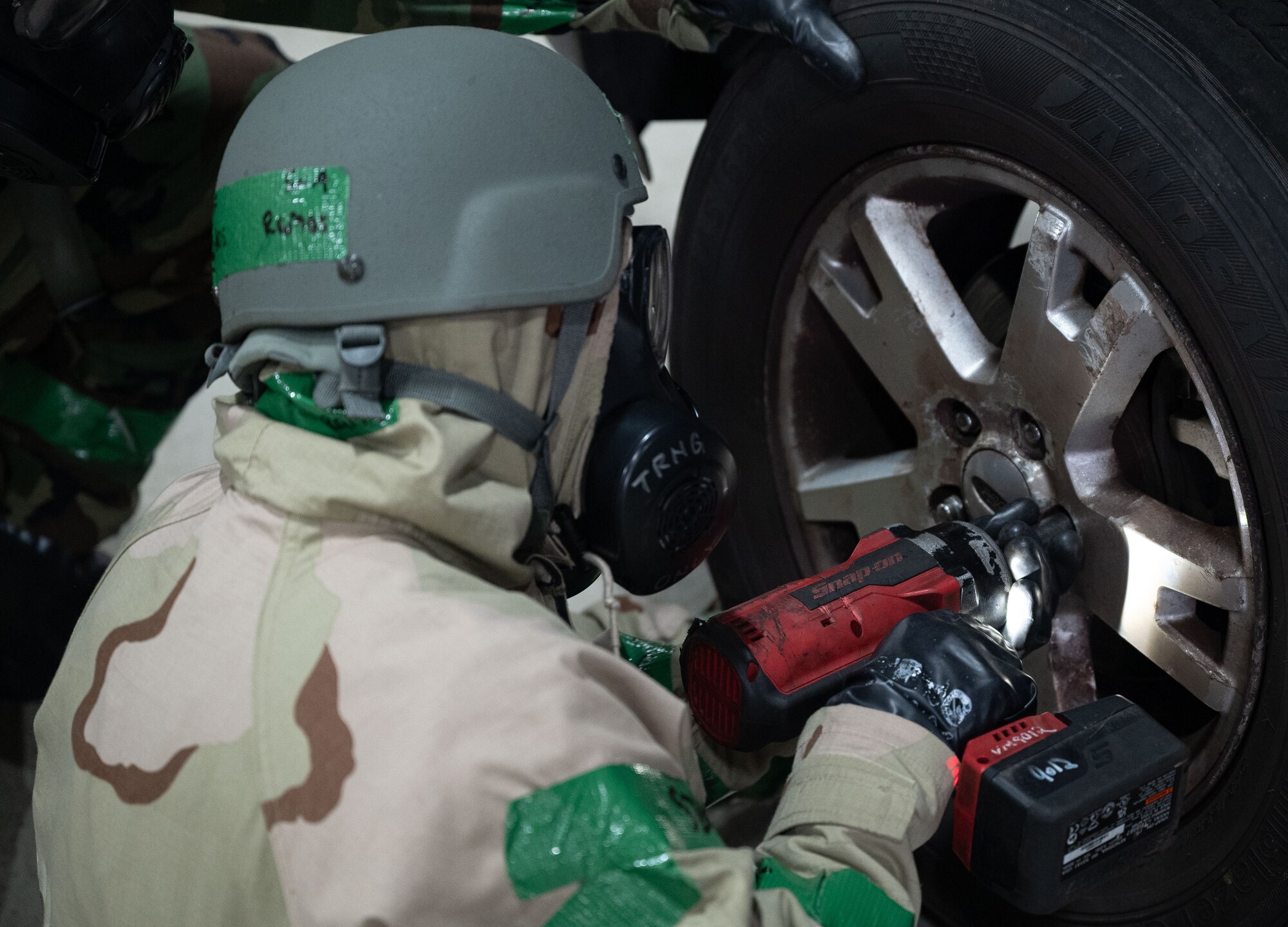 U.S. Air Force Senior Airman Carlos Ramos, 100th Logistics Readiness Squadron Vehicle Management fire and refueling maintenance journeyman, tightens lug nuts on a replaced wheel at Royal Air Force Mildenhall, England, Sept. 20, 2024.