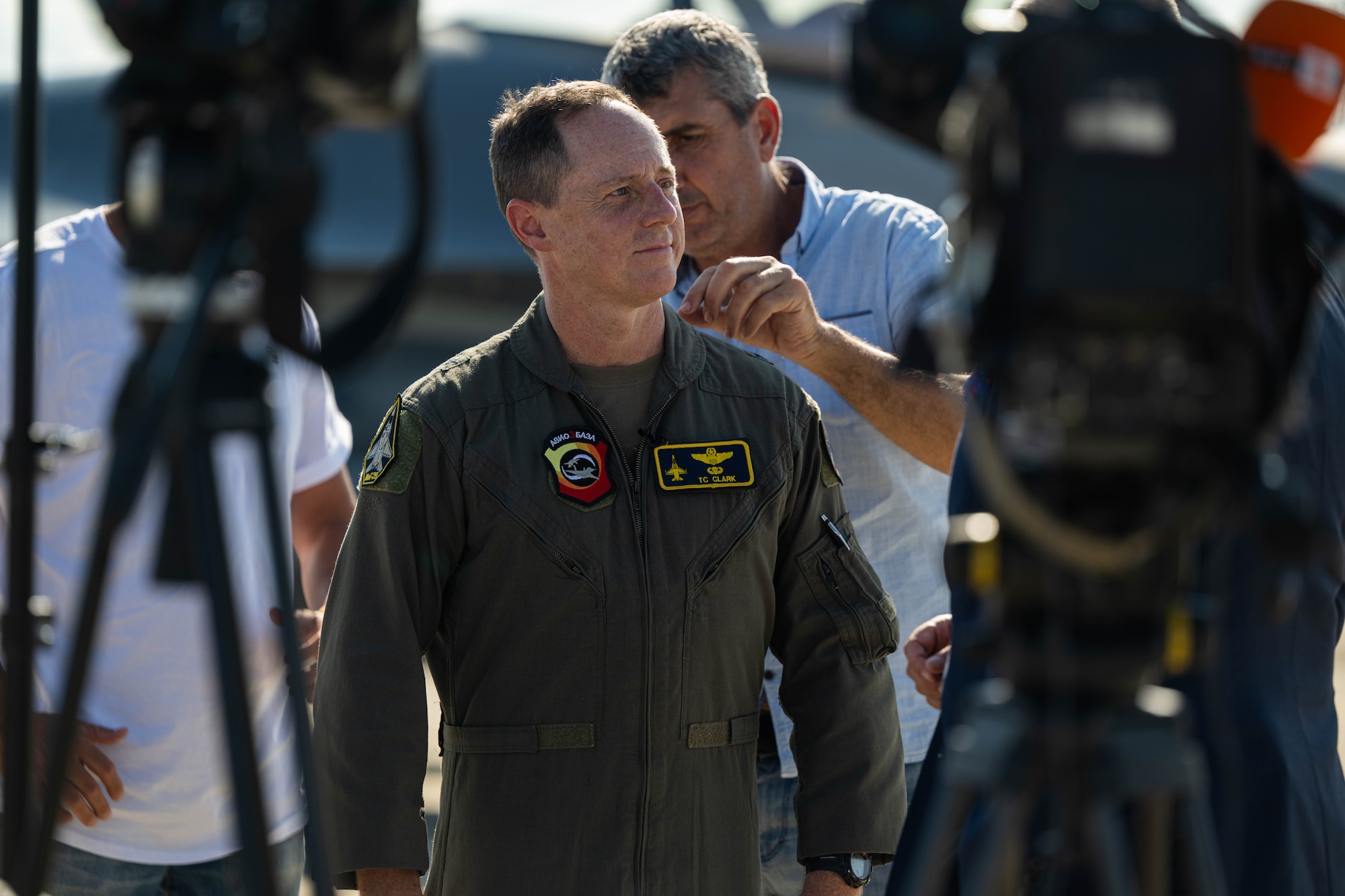 a military member gets ready for an interview