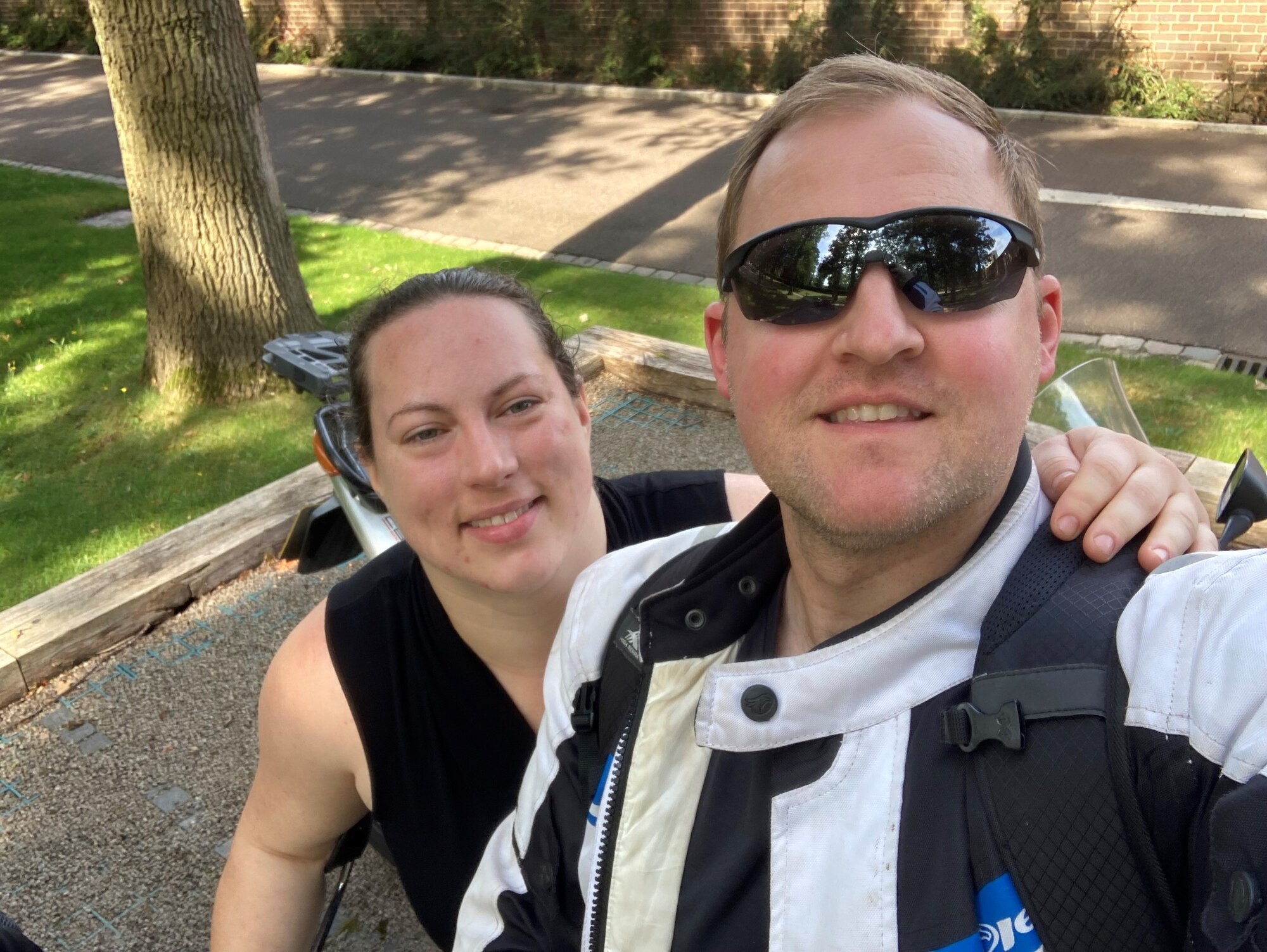 U.S. Air Force Staff Sgt. Michael Reed and his wife take a picture while volunteering at the Cambridge American Memorial Cemetery in England to help set up for Memorial Day. (Courtesy Photo)