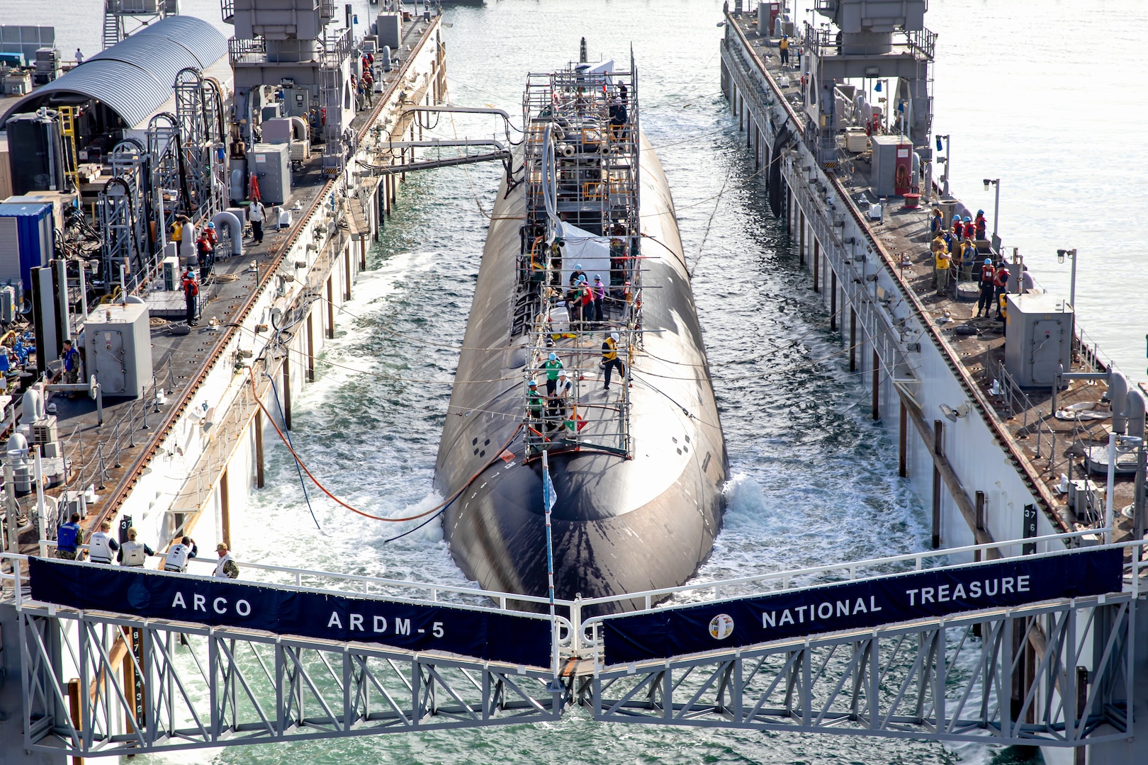 The Los Angeles-class fast-attack submarine USS Scranton (SSN 756) prepares to depart the floating dry dock ARCO (ARDM 5) at Naval Base Point Loma, California, Sept. 4, 2024. Scranton is part of Commander, Submarine Squadron 11, home to five Los Angeles-class fast-attack submarines, which are capable of supporting various missions, including: anti-submarine warfare; anti-ship warfare; strike warfare; and intelligence, surveillance, and reconnaissance. ARCO is a medium auxiliary floating dry dock for repair and is a CSS-11 asset under the operational control of Commander, Submarine Force, U.S. Pacific Fleet. (U.S. Navy photo by Mass Communication Specialist 1st Class Aaron T. Smith)