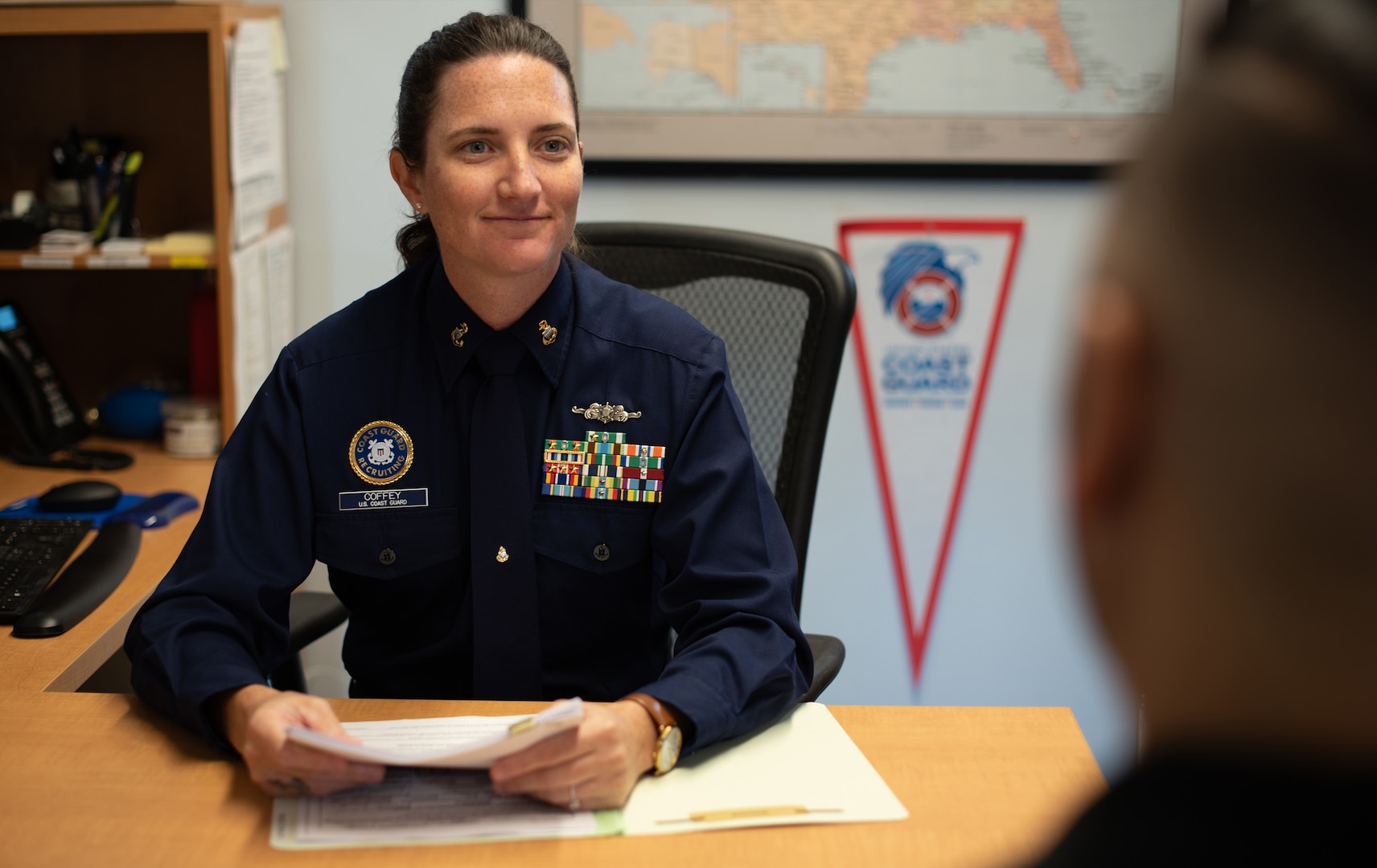 Coast Guard Chief Petty Officer Jenna Coffey, a production recruiter at Recruiting Office D.C., talks about enlistment opportunities and incentives in Washington, D.C., September 19, 2024. (U.S. Coast Guard photo by Petty Officer 1st Class Zachary Hupp)