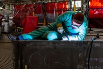 Parker McKane, welder, Shop 26, Welders, works on a section of a Reactor Compartment Disposal package in Building 460, Sept. 11, 2024, at Puget Sound Naval Shipyard & Intermediate Maintenance Facility in Bremerton, Washington. Shop 26 recently completed its fourth RCD package with zero rejectable conditions on all volumetrically inspected weld joints. Volumetrically inspected joints are critical welds used on all submarines and aircraft carriers. The welds are inspected using ultrasound or radiographic equipment. (U.S. Navy photo by Wendy Hallmark)