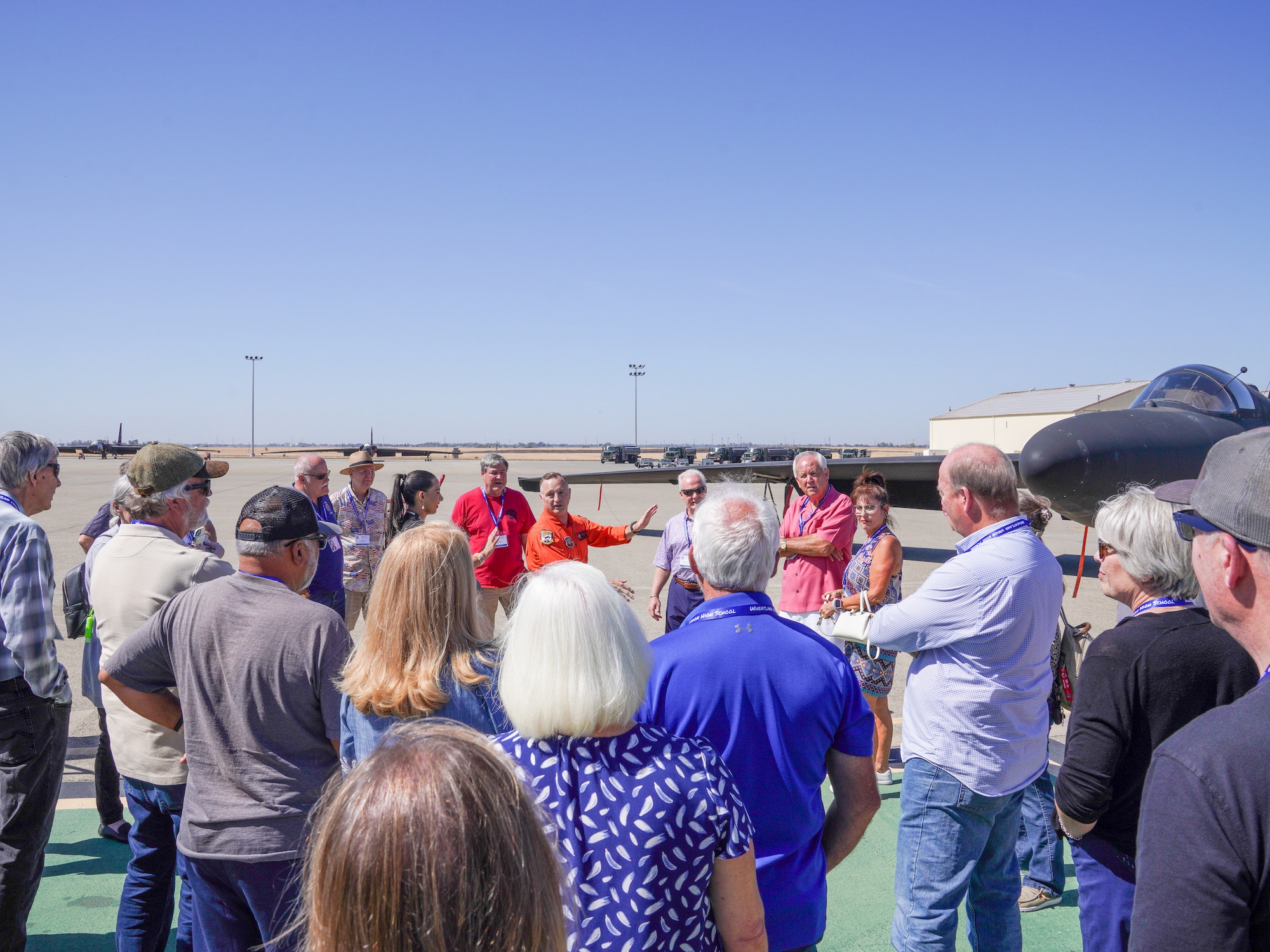 Cory Bartholomew, 1st Reconnaissance Wing U-2 instructor pilot, provides members of the Wheatland Union High School Class of 1974 a tour of the U-2 Dragon Lady at Beale Air Force Base, California, Sept. 20, 2024.