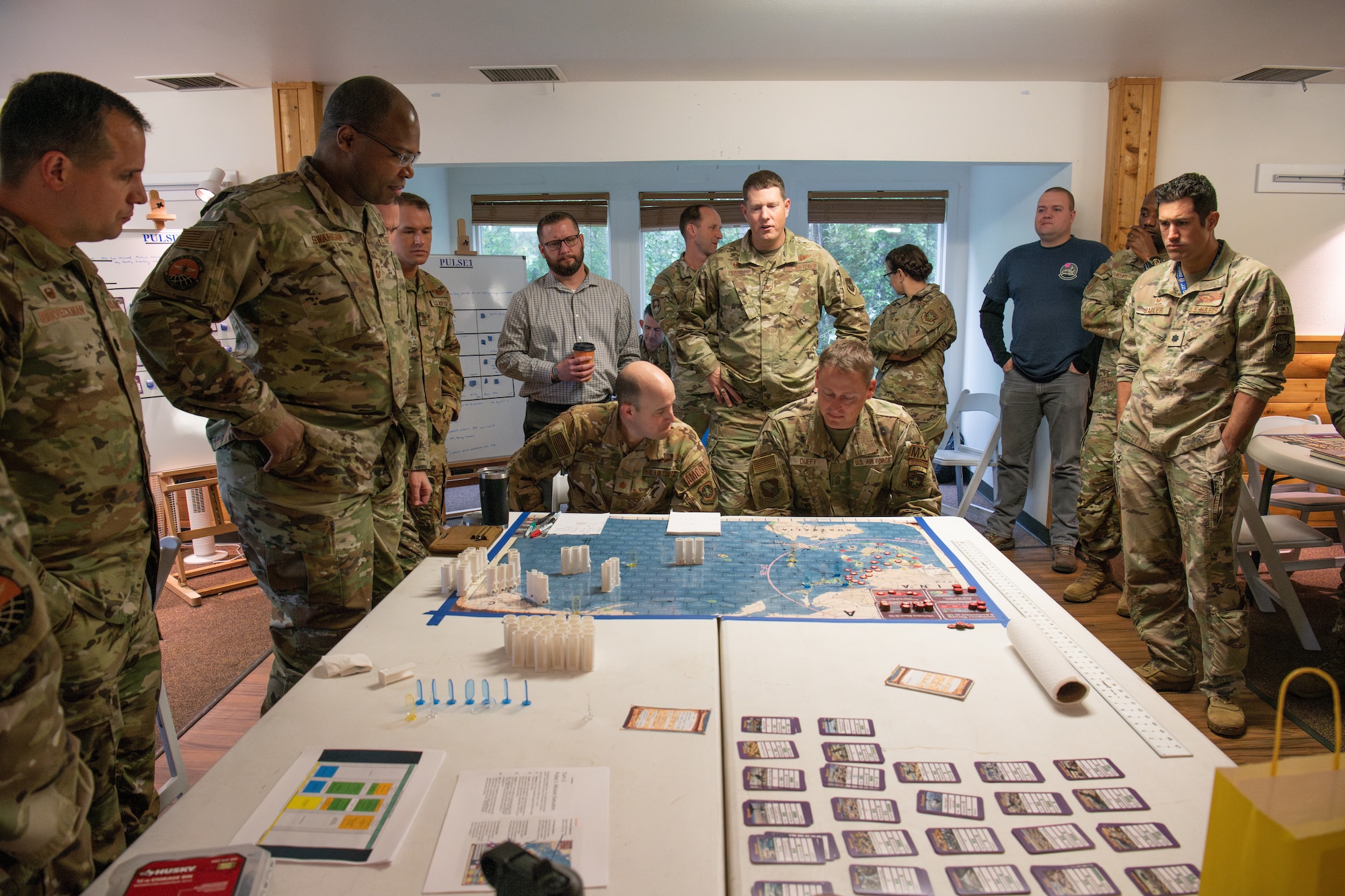 Photo of leaders playing Kingfish ACE board game.
