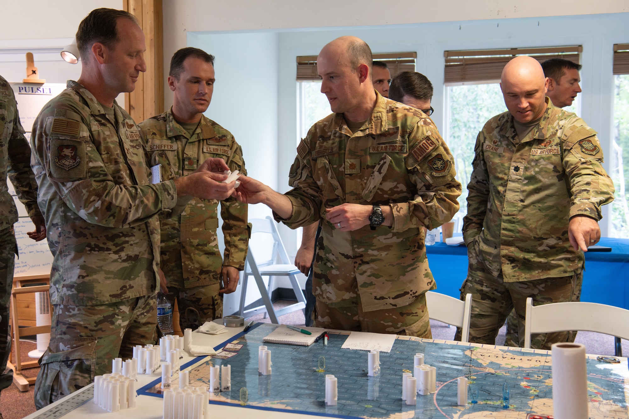 Photo of leaders playing Kingfish ACE board game.