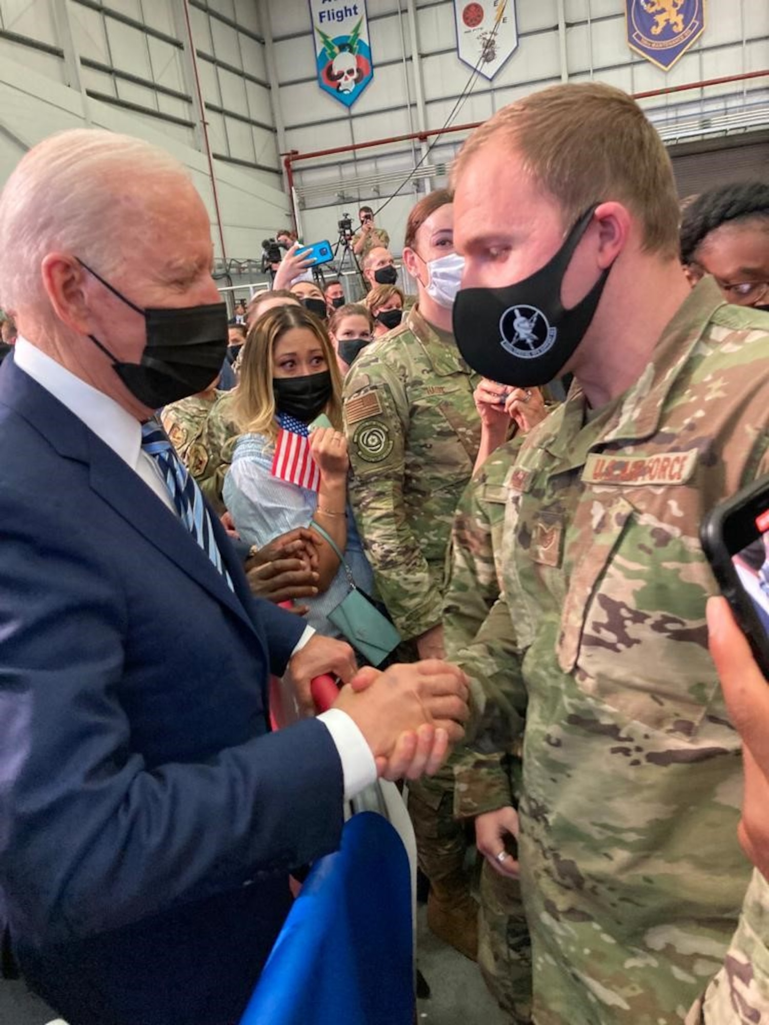 U.S. President Joe Biden shakes Staff Sgt. Michael Reed’s hand at RAF Mildenhall. (Courtesy Photo)