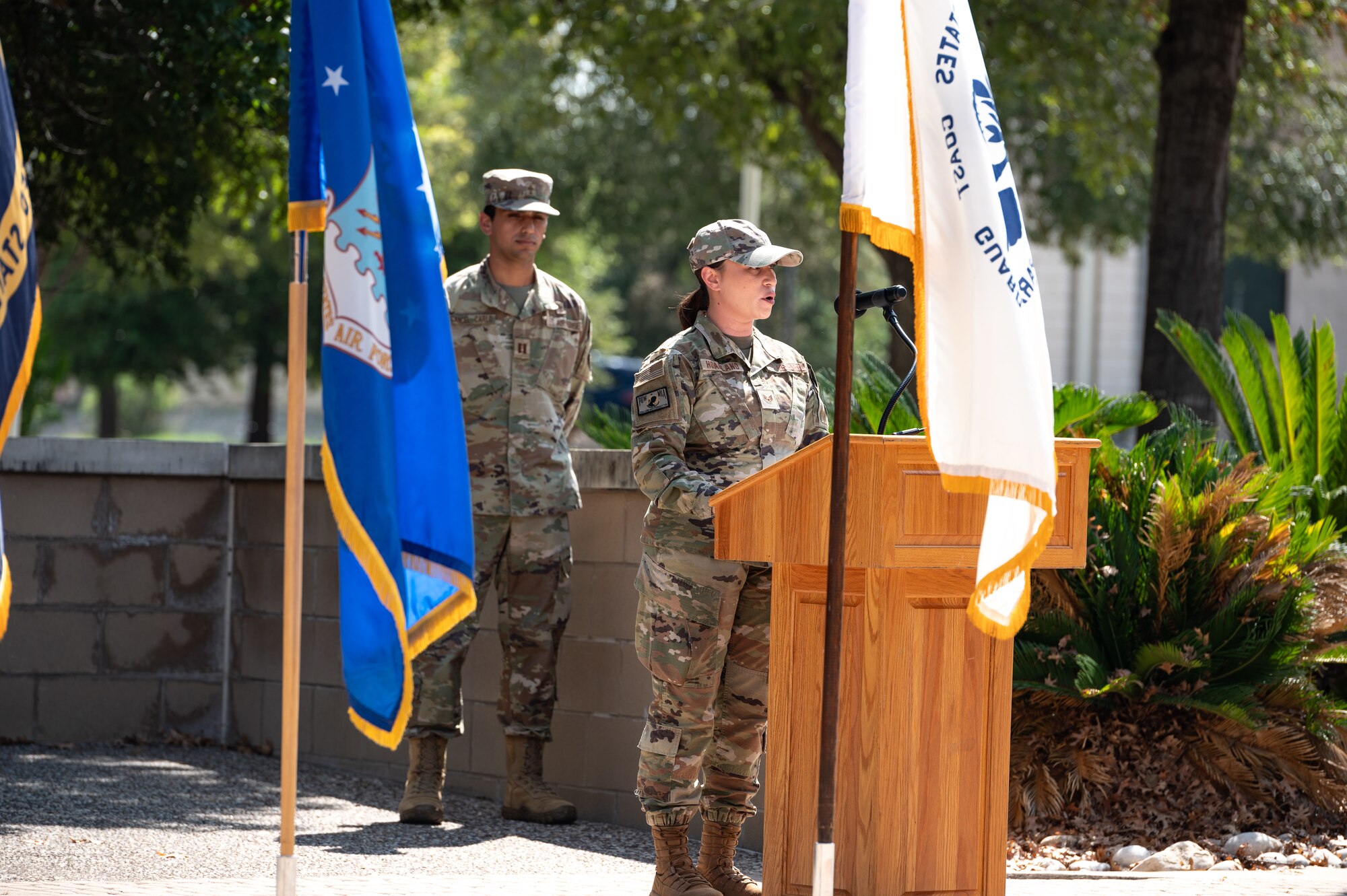 U.S. Air Force Airmen from the 47th Security Forces Squadron hold flags during a Prisoners of War (POW) and Missing in Action (MIA) closing ceremony at Laughlin Air Force Base, Texas, Sept. 20, 2024. The POW/MIA flag was created by the National League of Families in 1971. (U.S. Air Force photo by Senior Airman Keira Rossman)