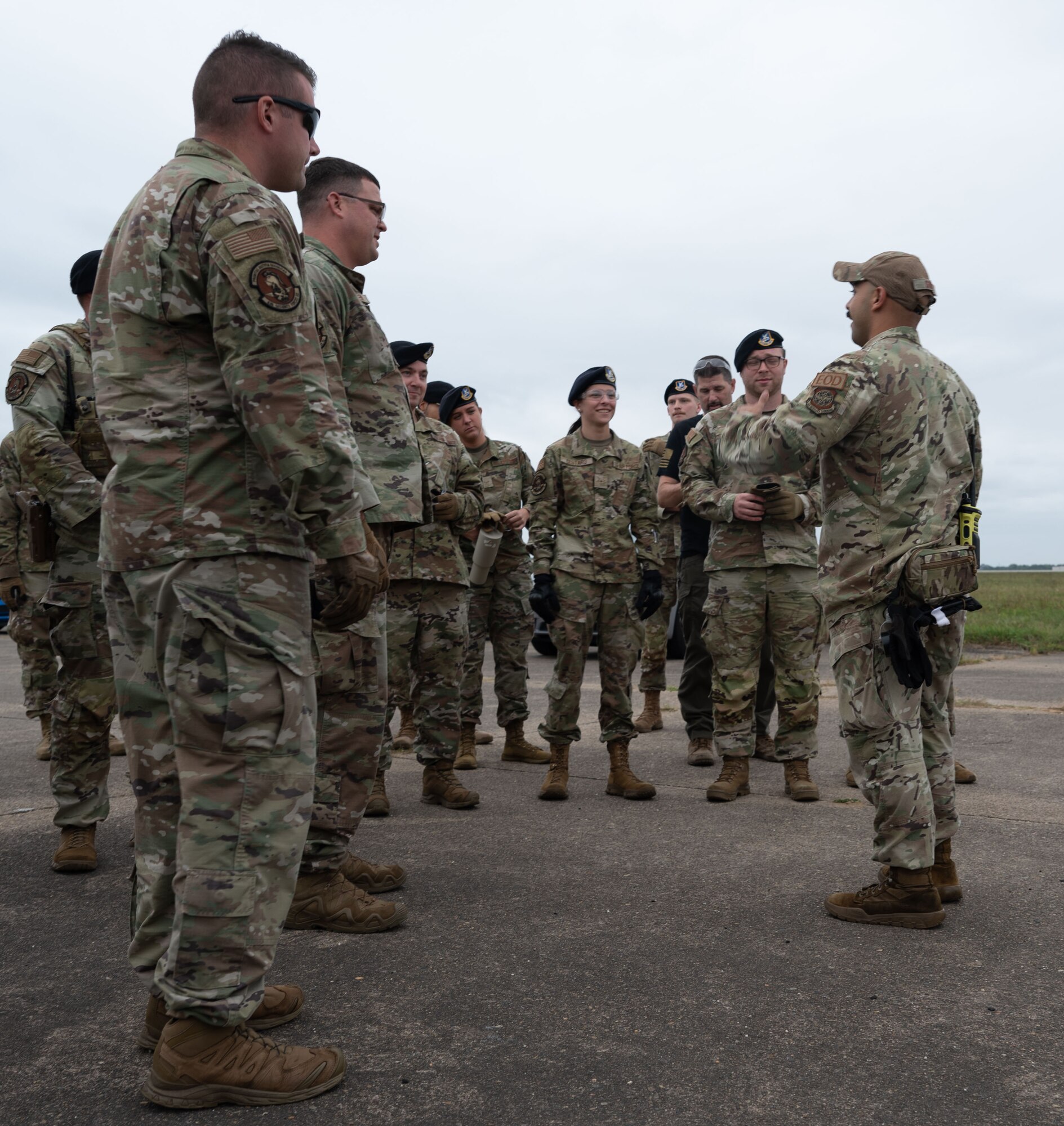 436th Security Forces Squadron members receive a safety brief before participating in smoke grenade training at Dover Air Force Base, Delaware, Sept. 23, 2024. This training was used to recertify the 436th SFS members on smoke grenade usage. (U.S. Air Force Photo by Senior Airman Dieondiere Jefferies)