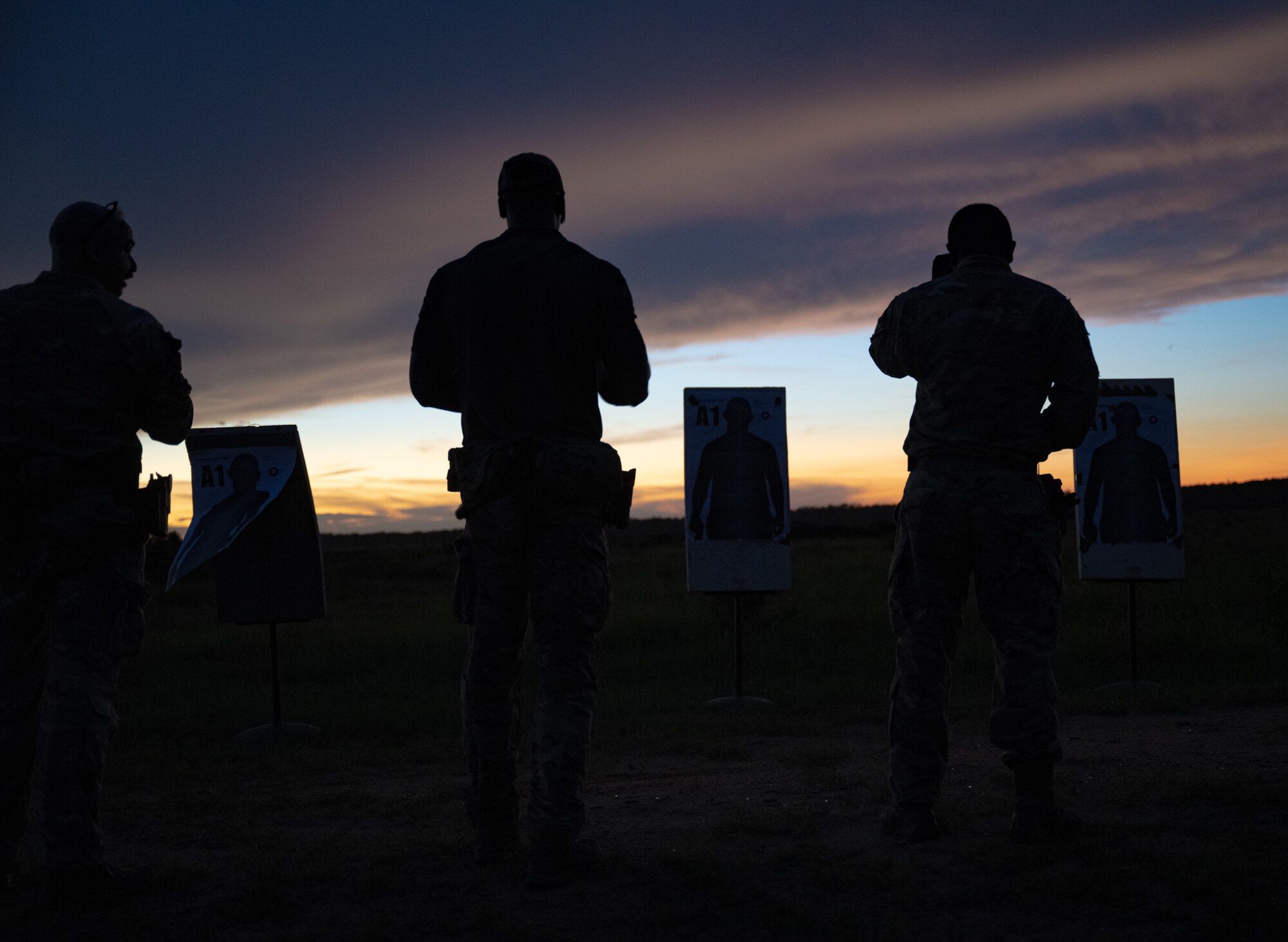 U.S. Airmen assigned to the 1st Special Operations Support Squadron Mission Sustainment Team prepare to fire at a night range exercise at Eglin Air Force Base, Florida, Aug. 27, 2024.
