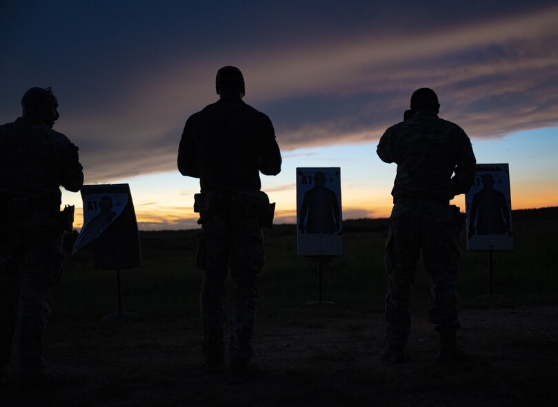 U.S. Airmen assigned to the 1st Special Operations Support Squadron Mission Sustainment Team prepare to fire at a night range exercise at Eglin Air Force Base, Florida, Aug. 27, 2024.