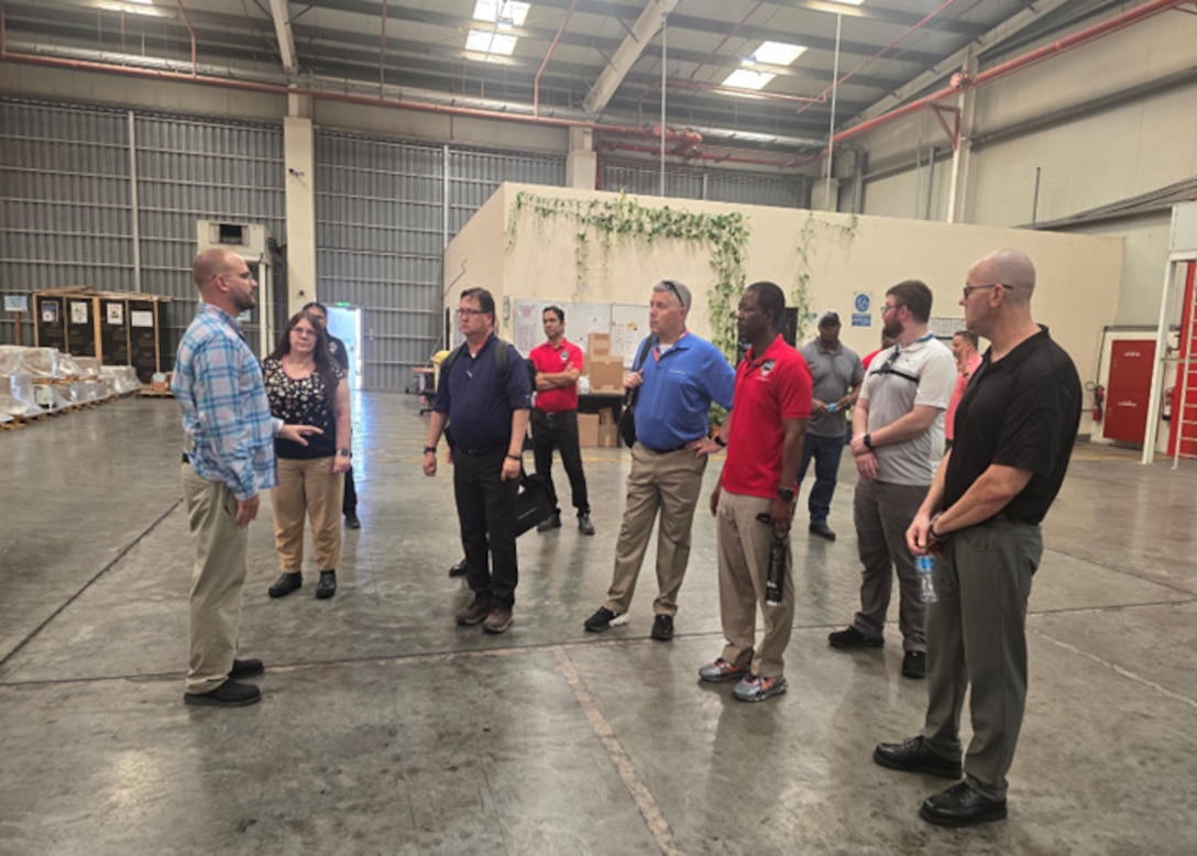 People in warehouse.