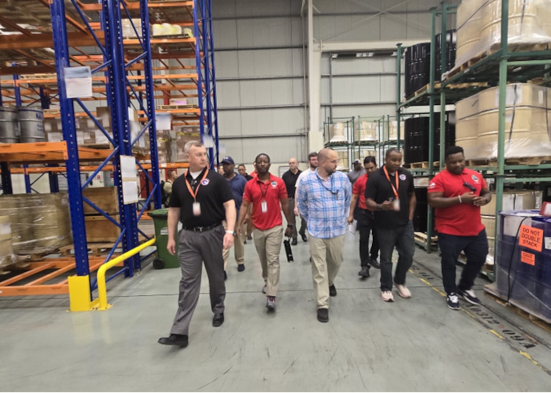 People in warehouse.