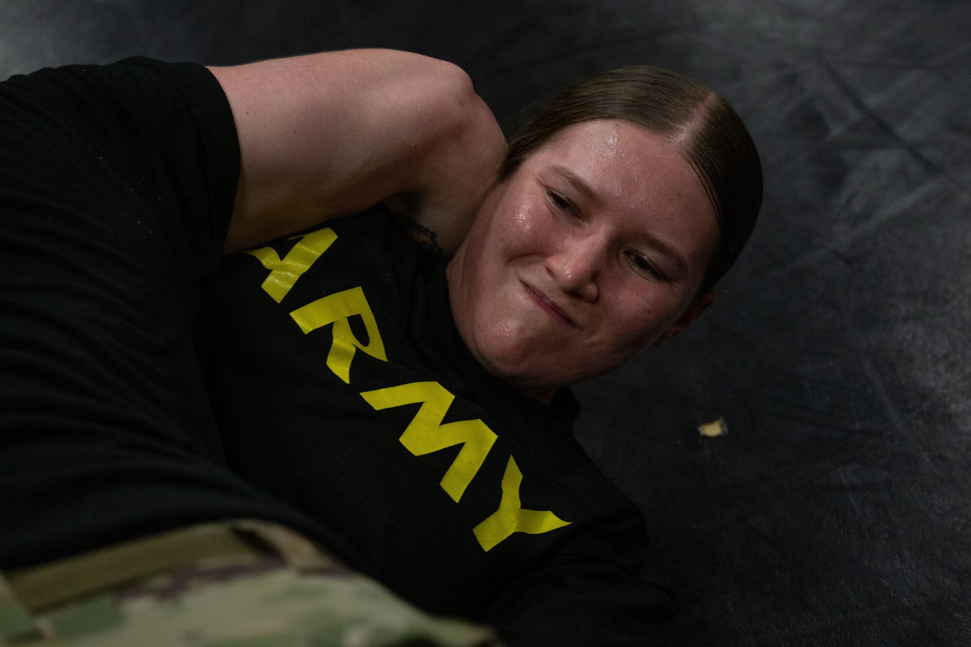 Female soldier wrestles