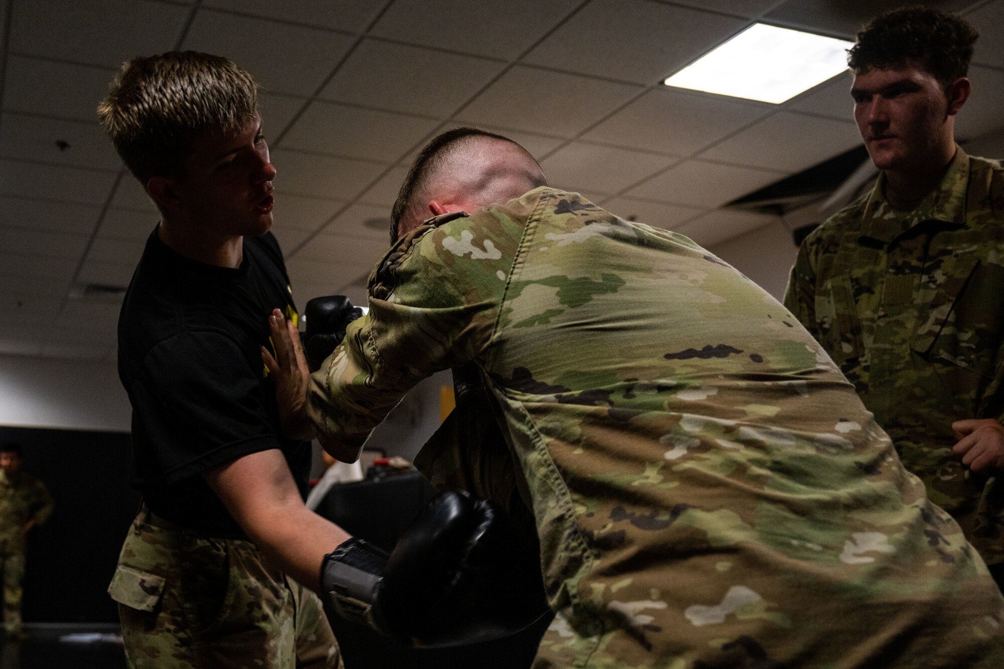 Service members practice combative drill
