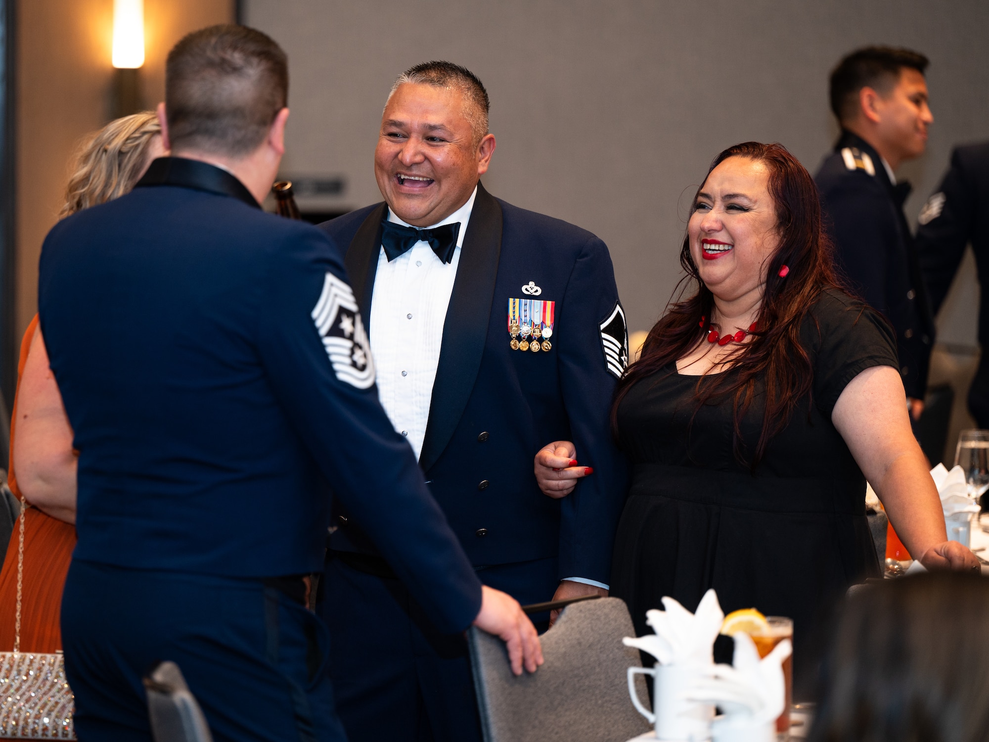 Dyess Air Force Ball attendees converse during social hour at the DoubleTree by Hilton, Abilene, Texas, Sept. 21, 2024. The Dyess Air Force Base Ball was held in celebration of the Air Force’s 77th anniversary. (U.S. Air Force photo by Airman 1st Class Jade M. Caldwell)