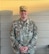 Male U.S. Army Soldier in uniform poses for a headshot.