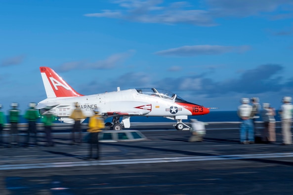 The Nimitz-class aircraft carrier USS Dwight D. Eisenhower (CVN 69) (IKE) hosted student naval aviators Sept. 24 from Training Air Wing (TW) 1, composed of Training Squadron (VT) 7 and VT-9 from Naval Air Station Meridian, Mississippi, and TW-2, composed of VT-21 and VT-22 from Naval Air Station Kingsville, Texas, as a part of carrier qualification (CQ) training off the coast of Florida.