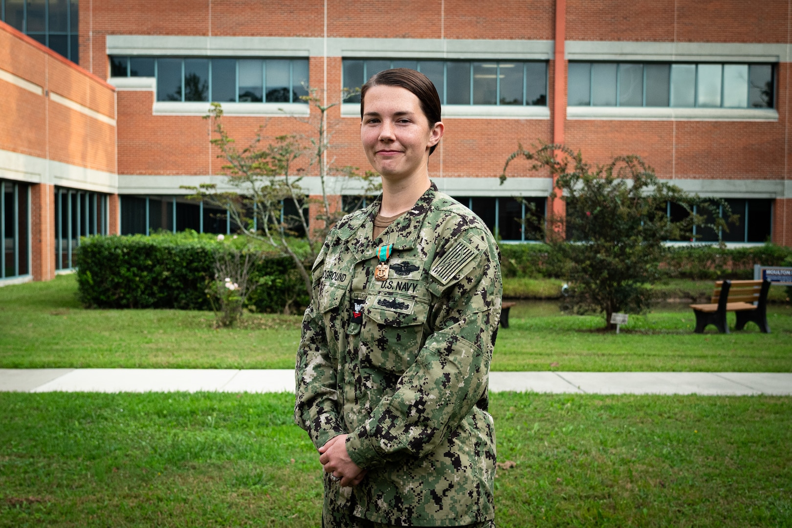 Hospital Corpsman Second Class Victoria Synoground received the Navy and Marine Corps Achievement Medal for her exceptional service during a ceremony held Wednesday, August 25 aboard Naval Health Clinic Cherry Point.
Synoground serves abord the clinic in the Patient Administration Department as the Command Limited Duty Coordinator.  As the LIMDU Coordinator, Synoground’s process improvement efforts and time as a Lean Six Sigma Project team member reduced the Command’s Limited Duty Time by more than 20 days.