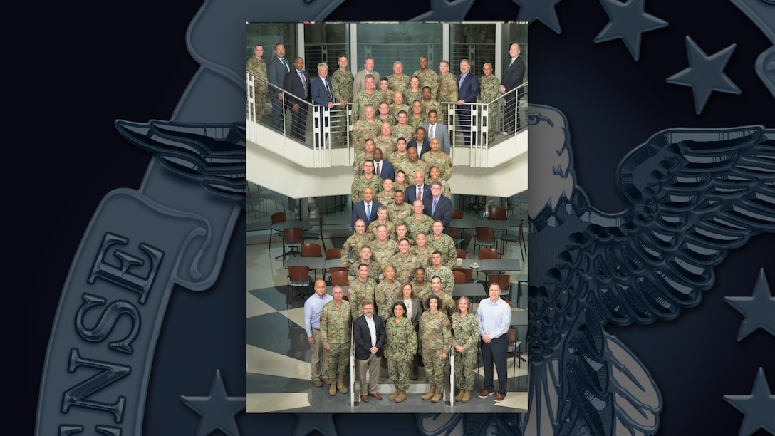 Participants in the Senior Leader Orientation Course gather for a group photo