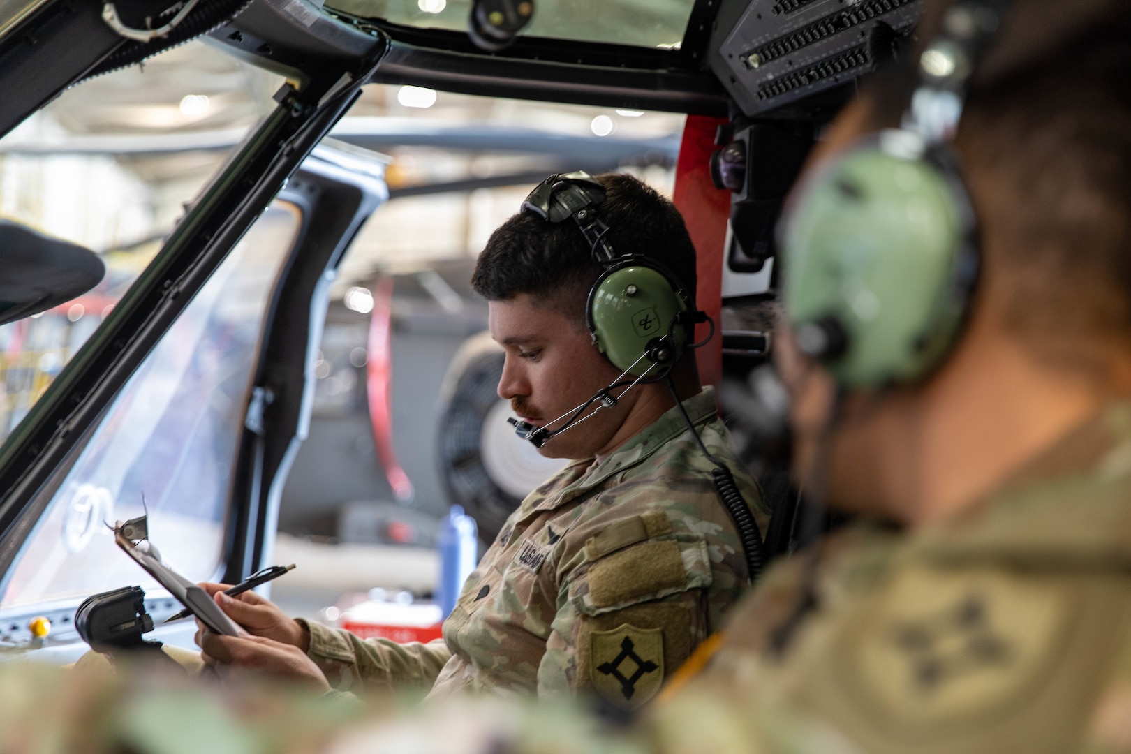 The Florida Army National Guard's 1st Battalion, 111th Aviation Regiment, prepares a UH-60 Black Hawk helicopter for support operations ahead of Hurricane Helene, Wednesday, Sept. 25, 2024.