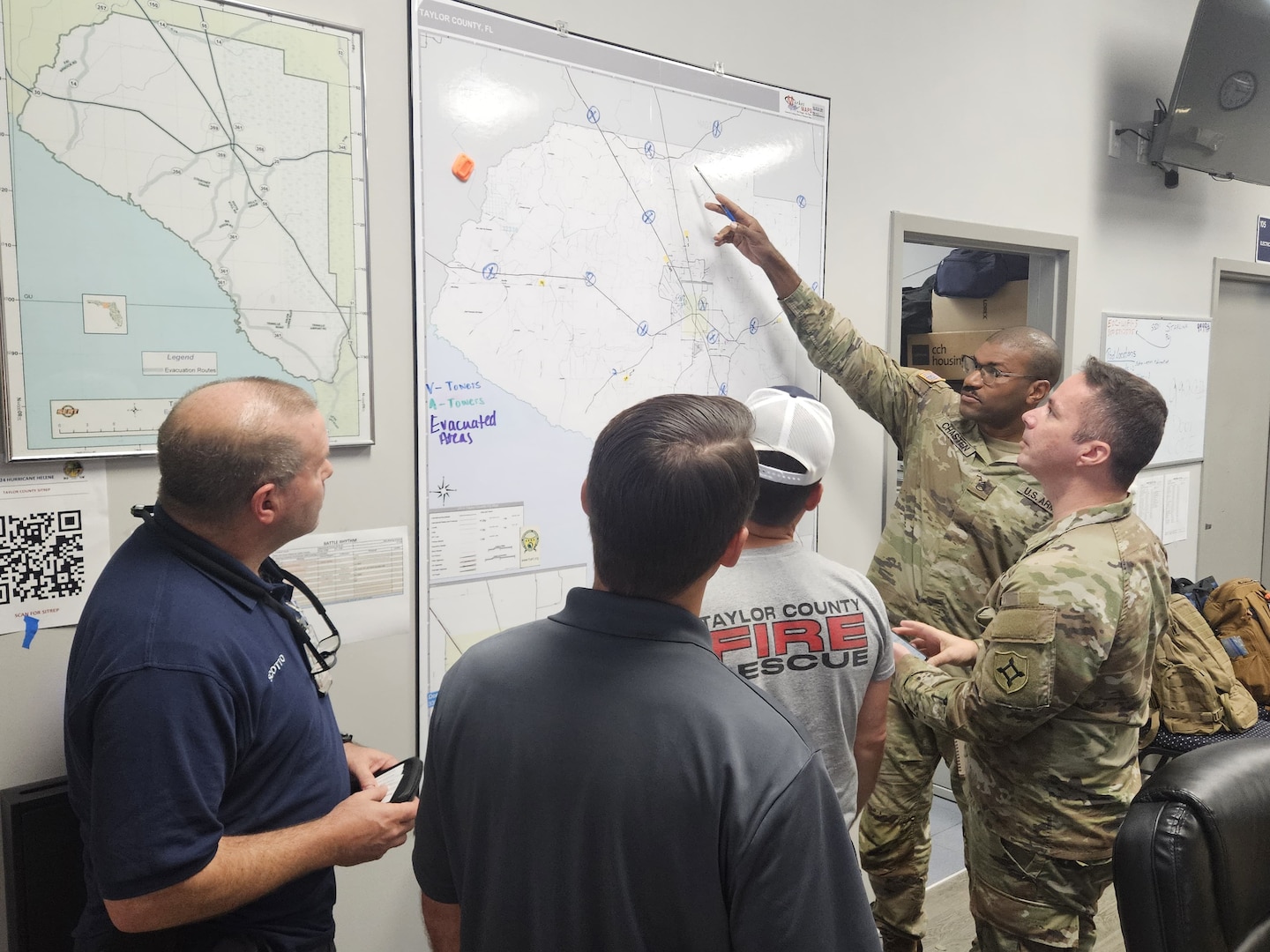 Florida Army National Guard, State Guard, local law enforcement, EMS, and fire personnel work together at an emergency operations center in Perry, Fla., Sept. 26, 2024. Response to Hurricane Helene is a massive team effort, and FLARNG fully mobilizes all available forces.