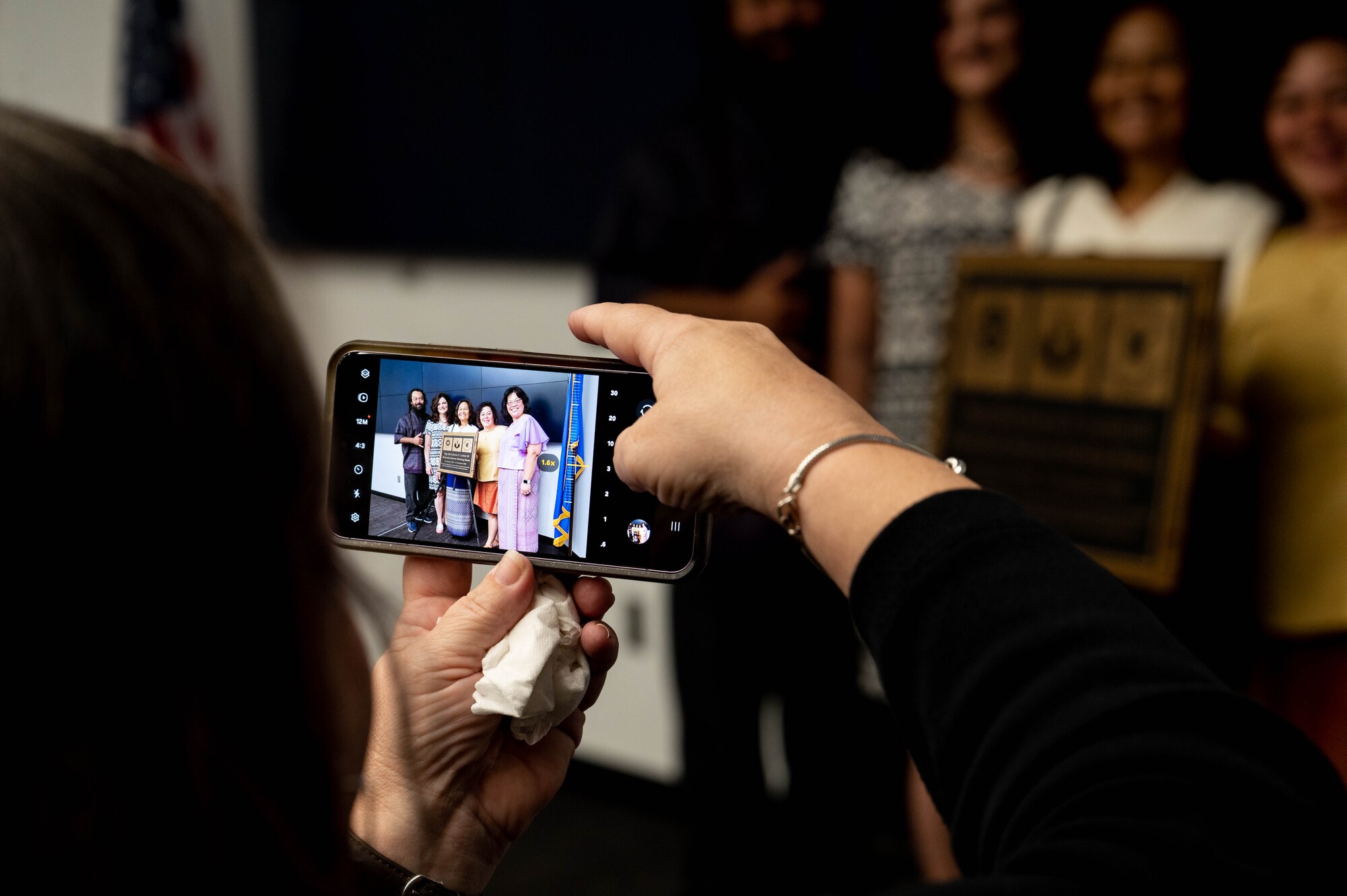 Person takes picture with phone