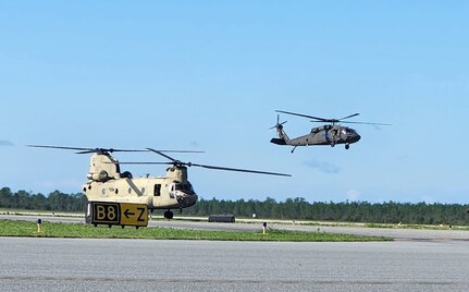 UH-60 and CH-47 aircraft with the 1-111th Florida Army National Guard land in Tallahassee, Fla., for refueling Sept. 27, 2024, as they continue search and rescue operations throughout the impacted area after Hurricane Helene.