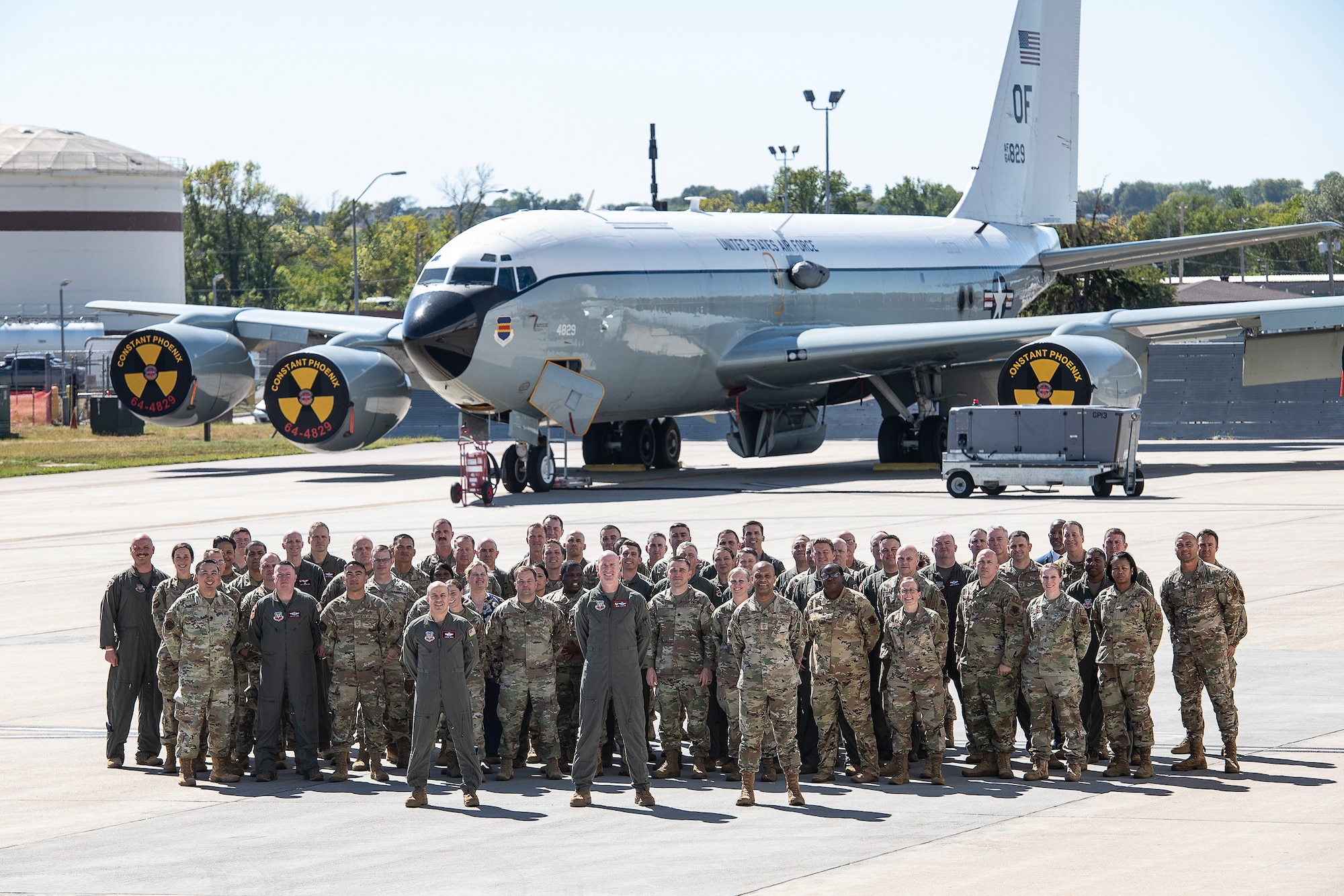 55th Wing commanders, senior enlisted leaders and civilian leaders pose for a photo in front of a WC-135 CONSTANT PHOENIX at Offutt Air Force Base on Sept. 26, 2024.  Col. Mark Howard, 55th Wing commander, and Chief Master Sgt. Andrew Small, 55th Wing command chief, hosted the annual 2024 Leadership Conference at Offutt Air Force Base, Sept. 26-27.