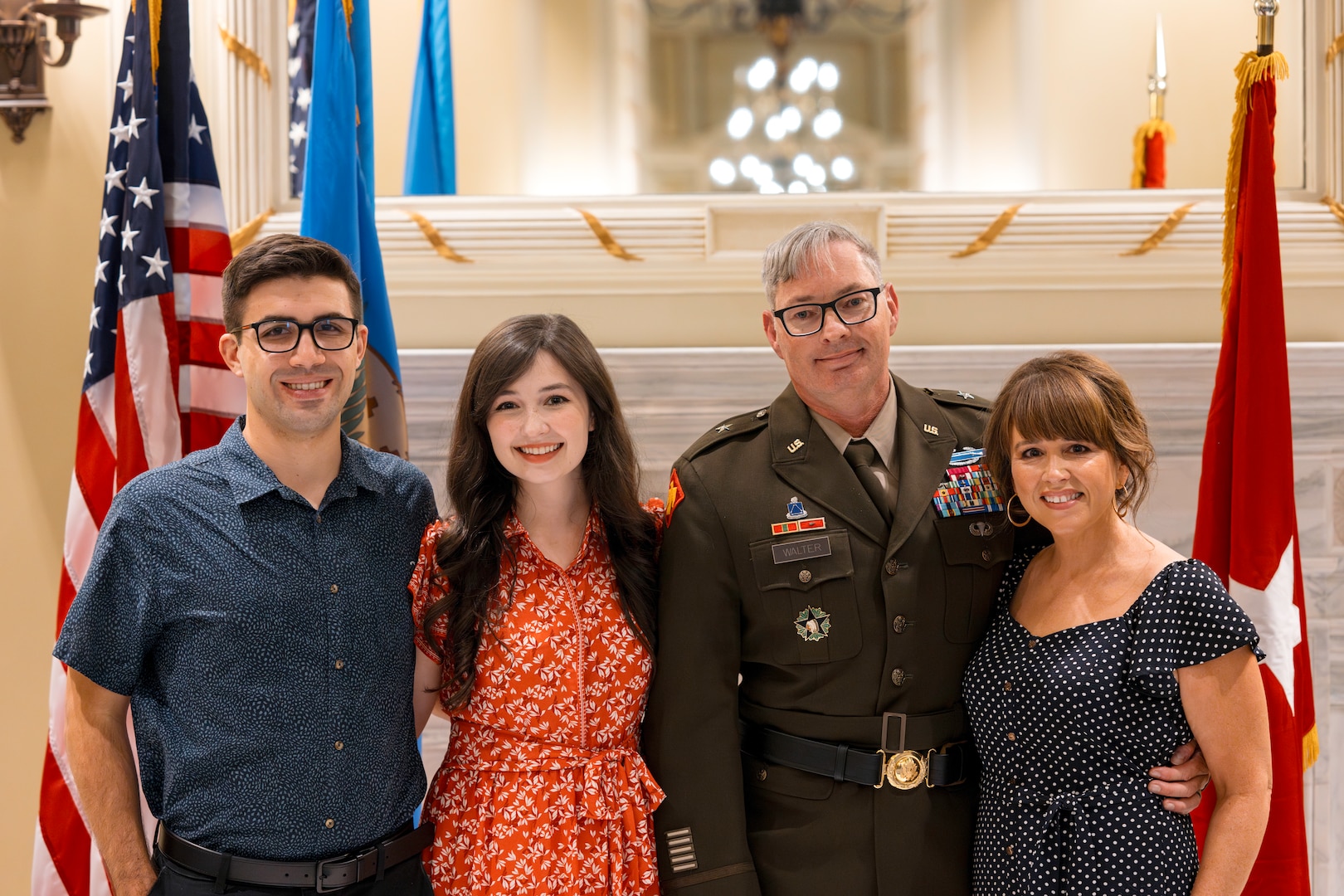 Brig. Gen. Robert Walter, assistant adjutant general for the Oklahoma National Guard, stands with his family after his promotion ceremony held in the Blue Room at the Oklahoma Capitol on Sept. 26, 2024. Walter serves as the assistant adjutant general - Army for the Oklahoma National Guard and advises and assists the adjutant general in preparing Oklahoma Army National Guard units for domestic operations and mobilization. (Oklahoma National Guard photo by 1st Sgt. Mireille Merilice-Roberts)