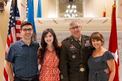 Brig. Gen. Robert Walter, assistant adjutant general for the Oklahoma National Guard, stands with his family after his promotion ceremony held in the Blue Room at the Oklahoma Capitol on Sept. 26, 2024. Walter serves as the assistant adjutant general - Army for the Oklahoma National Guard and advises and assists the adjutant general in preparing Oklahoma Army National Guard units for domestic operations and mobilization. (Oklahoma National Guard photo by 1st Sgt. Mireille Merilice-Roberts)