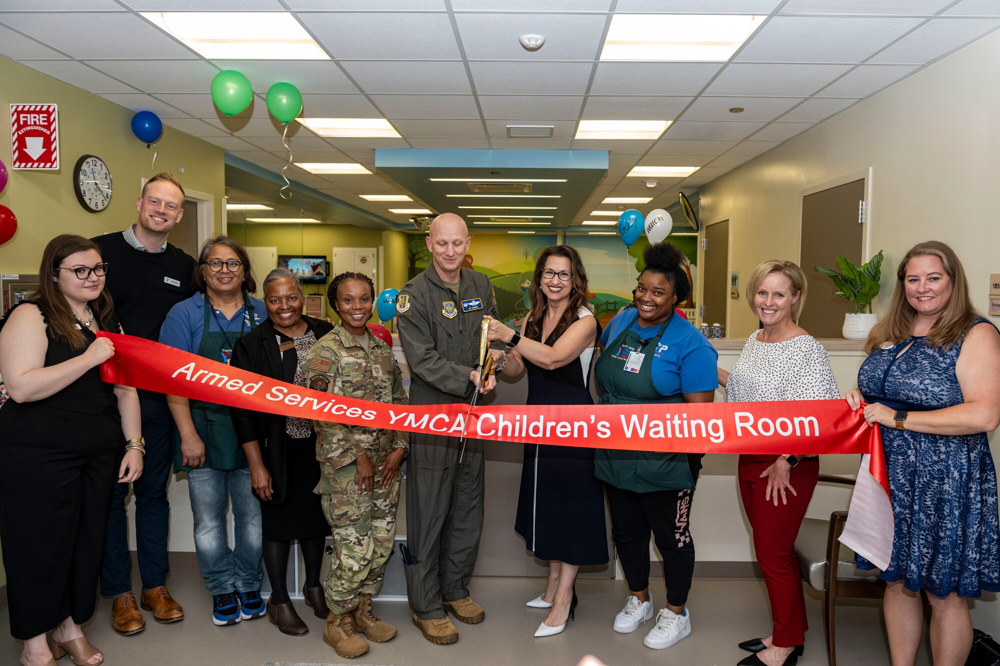 60th AMW commander cuts ribbon for grand reopening