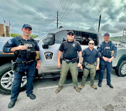 Maritime Safety and Security Team (MSST) Honolulu, stand with Department of Agriculture Guam Conservation Officers during a Ports, Waterways, and Coastal Security (PWCS) mission in Guam from Aug. 31 – Sept. 18, 2024.