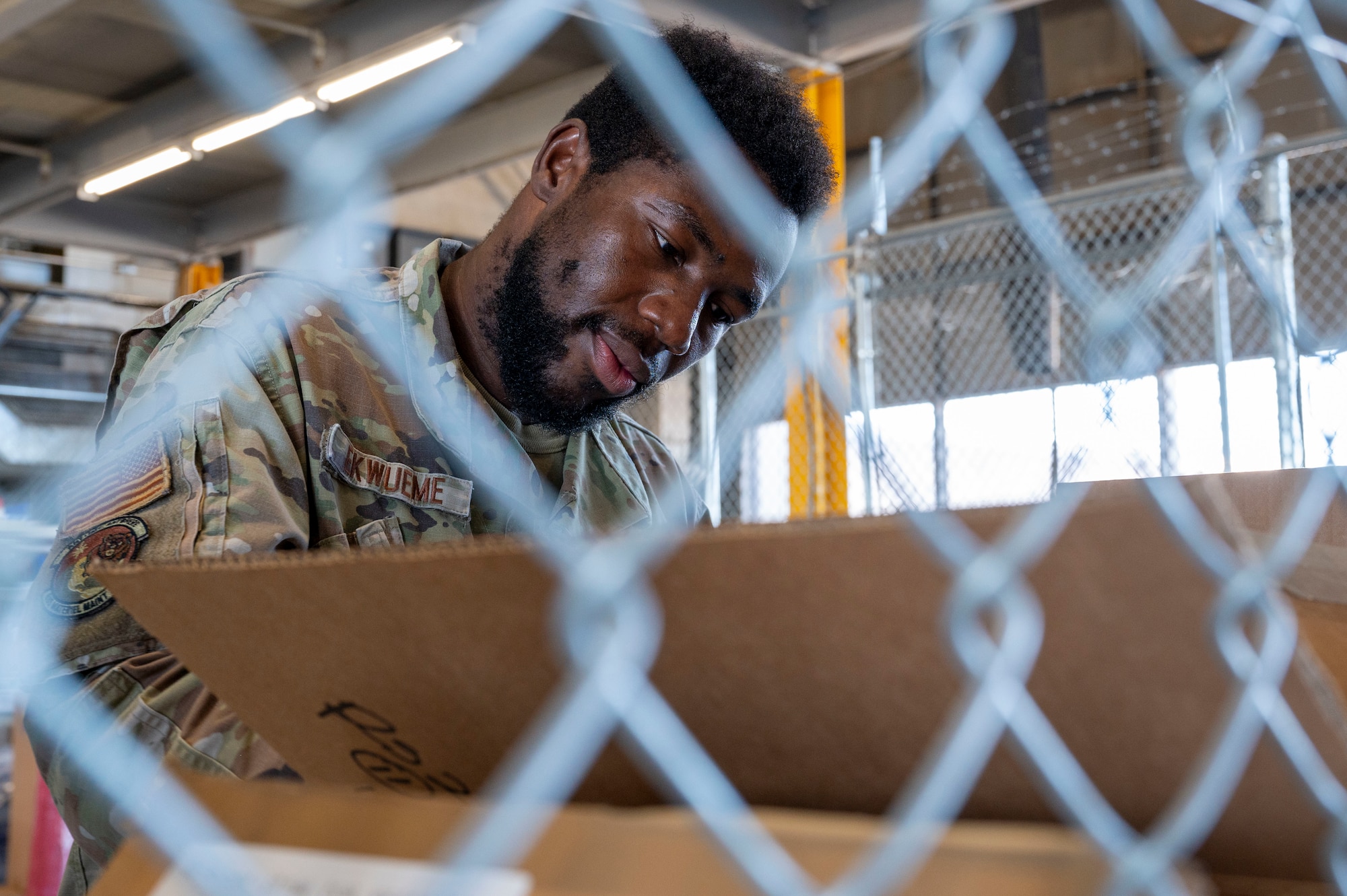U.S. Air Force Senior Airman Uchenna Ekwueme, 635th Materiel Maintenance Support Squadron cargo movement technician, processes an inbound shipment at Holloman Air Force Base, New Mexico, Sept. 18, 2024.