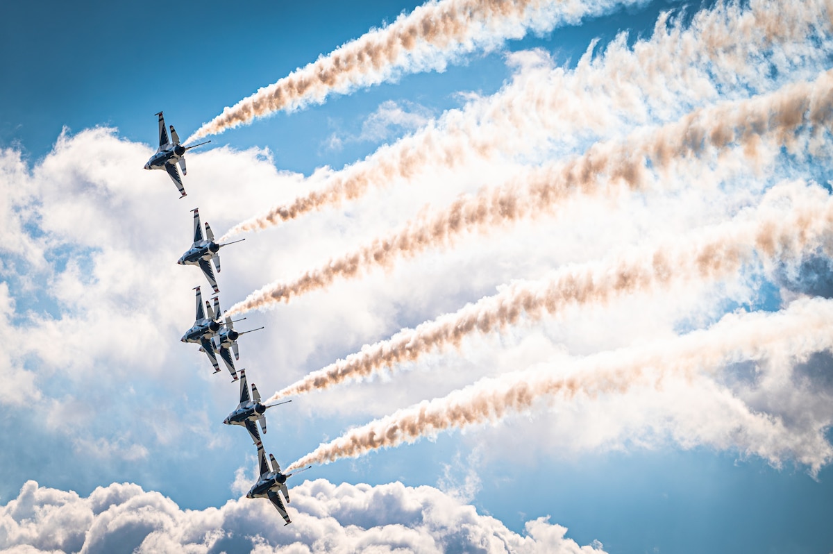 F-16 Fighting Falcons with the U.S. Air Force Air Demonstration Squadron, the Thunderbirds, perform