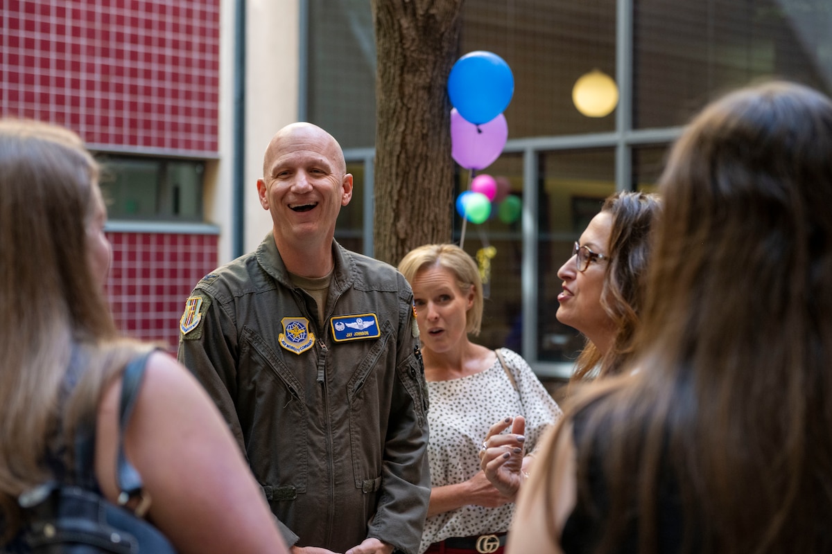 60th AMC commander speaks with event goers