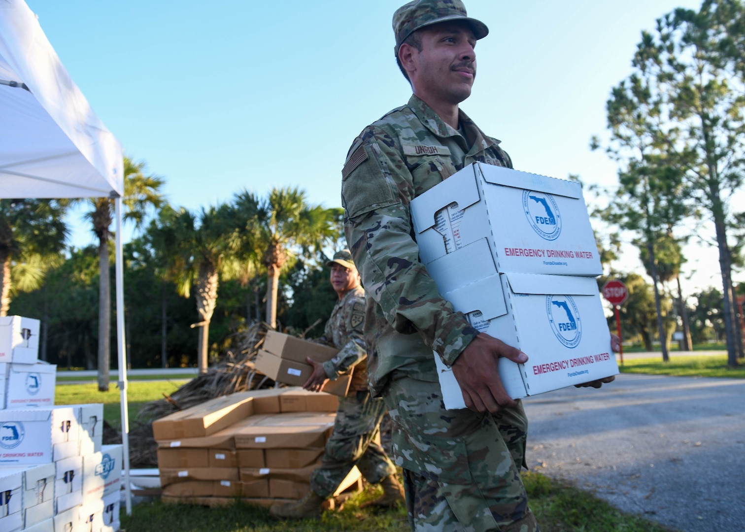 Florida Air National Guardsmen assigned to various squadrons across the 125th Fighter Wing pass out water and food to civilians in Bradenton, Florida, Sept. 28, 2024. The Florida National Guard established points of distribution throughout Florida and operated at logistic staging areas to ensure supplies are available to those in need after Hurricane Helene.