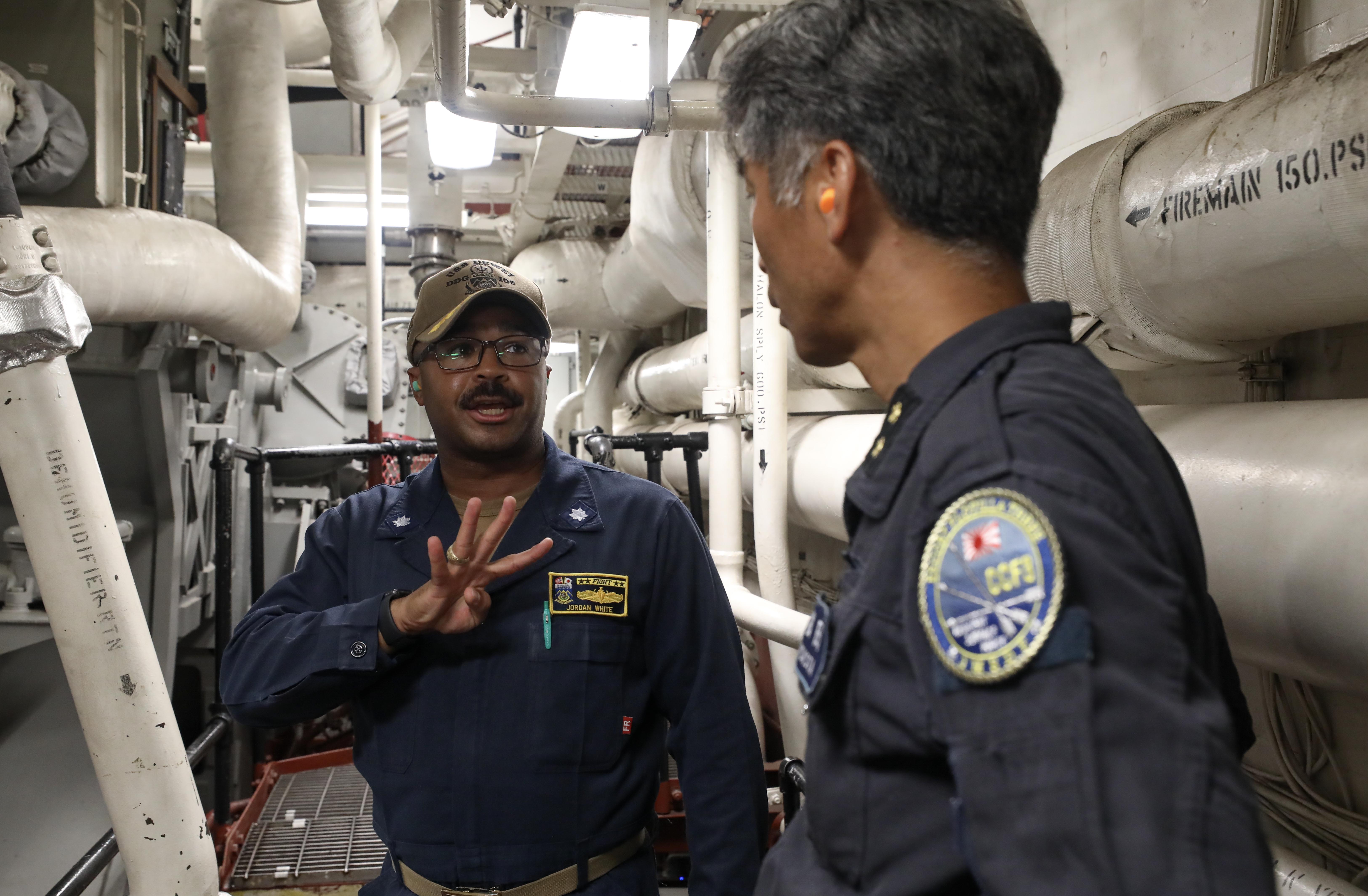 US, Australia, and Japan naval forces conduct multilateral
