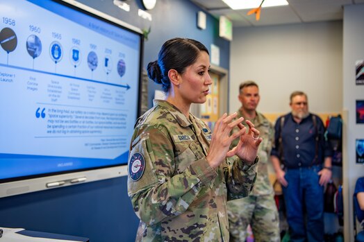  Woman in uniform briefing