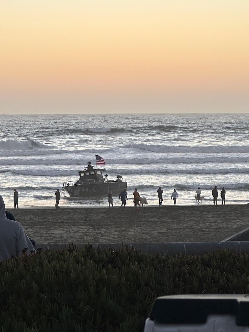 A private decommissioned 35-foot Navy patrol boat is seen aground on Ocean Beach, San Francisco