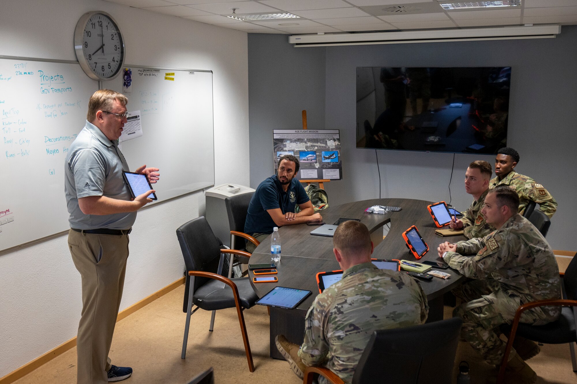 Harry Stone, Stone Aircraft Maintenance Solutions LLC CEO, presents the RANGER AGE Management System to members from the 86th Maintenance Squadron aerospace ground equipment unit at Ramstein Air Base, Germany, Sept. 24, 2024.