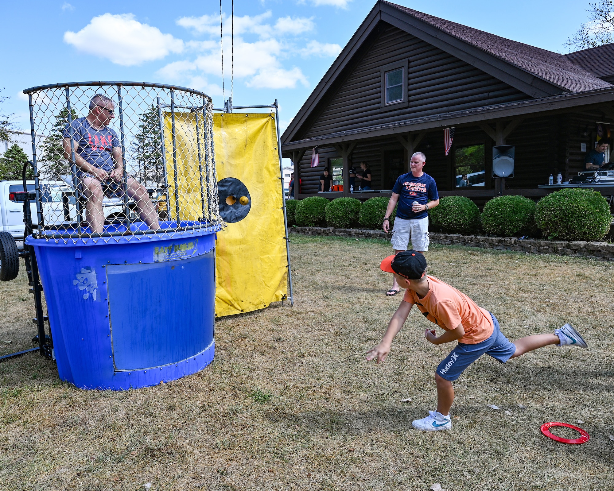 Citizen Airmen from the 445th Airlift Wing, families and friends enjoyed a day of food and fun at the wing’s annual family day tailgate event at Bass Lake on Wright-Patterson Air Force Base, Ohio, Sept. 14, 2024. Participants enjoyed corn hole, children’s bouncy houses, dunk tank, flag football, face painting and other activities. A C-17 Globemaster III static display was available for tours and a DJ was on hand for entertainment. In addition, various helping agencies provided useful information to Airmen and their families. The base USO provided a kids zone for the event.