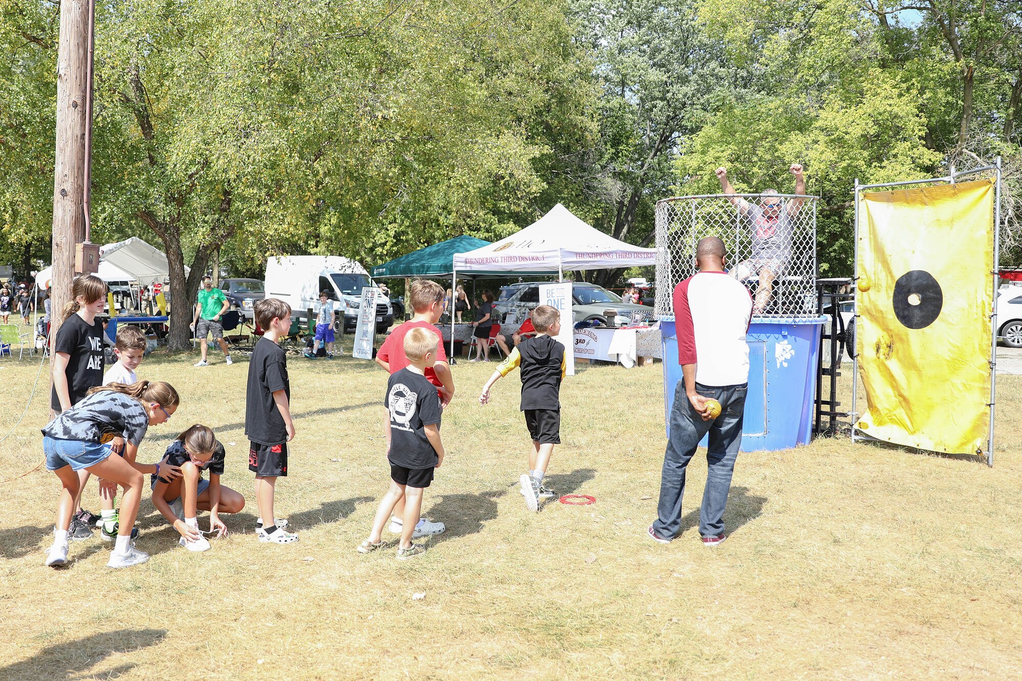Citizen Airmen from the 445th Airlift Wing, families and friends enjoyed a day of food and fun at the wing’s annual family day tailgate event at Bass Lake on Wright-Patterson Air Force Base, Ohio, Sept. 14, 2024. Participants enjoyed corn hole, children’s bouncy houses, dunk tank, flag football, face painting and other activities. A C-17 Globemaster III static display was available for tours and a DJ was on hand for entertainment. In addition, various helping agencies provided useful information to Airmen and their families. The base USO provided a kids zone for the event.