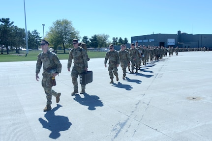 More than 300 Wisconsin Army National Guard Soldiers board charter flights Sept. 28, 2024, at Volk Field Air National Guard Base, Camp Douglas, Wis., following a formal sendoff ceremony. The Soldiers, part of the 1st Battalion, 128th Infantry Regiment, the 1st Battalion, 120th Field Artillery Regiment, the 132nd Brigade Support Battalion and the 457th Chemical Company, are deploying to U.S. Central Command in Southwest Asia and U.S. Africa Command, Horn of Africa.