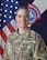 Female Soldier in front of United States and Army Recruiting Brigade flags